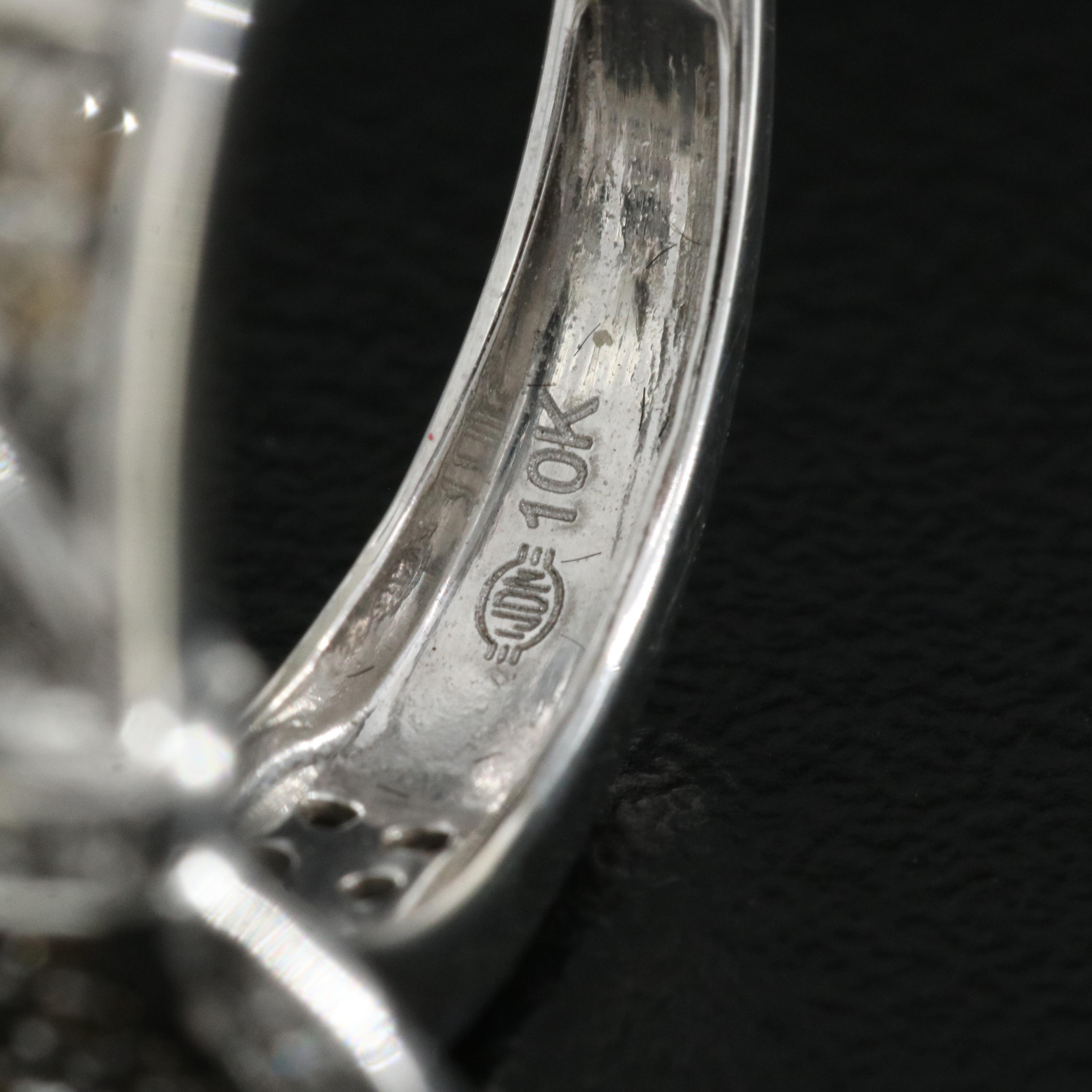 10K 0.37 CTW Diamond Buckle Ring