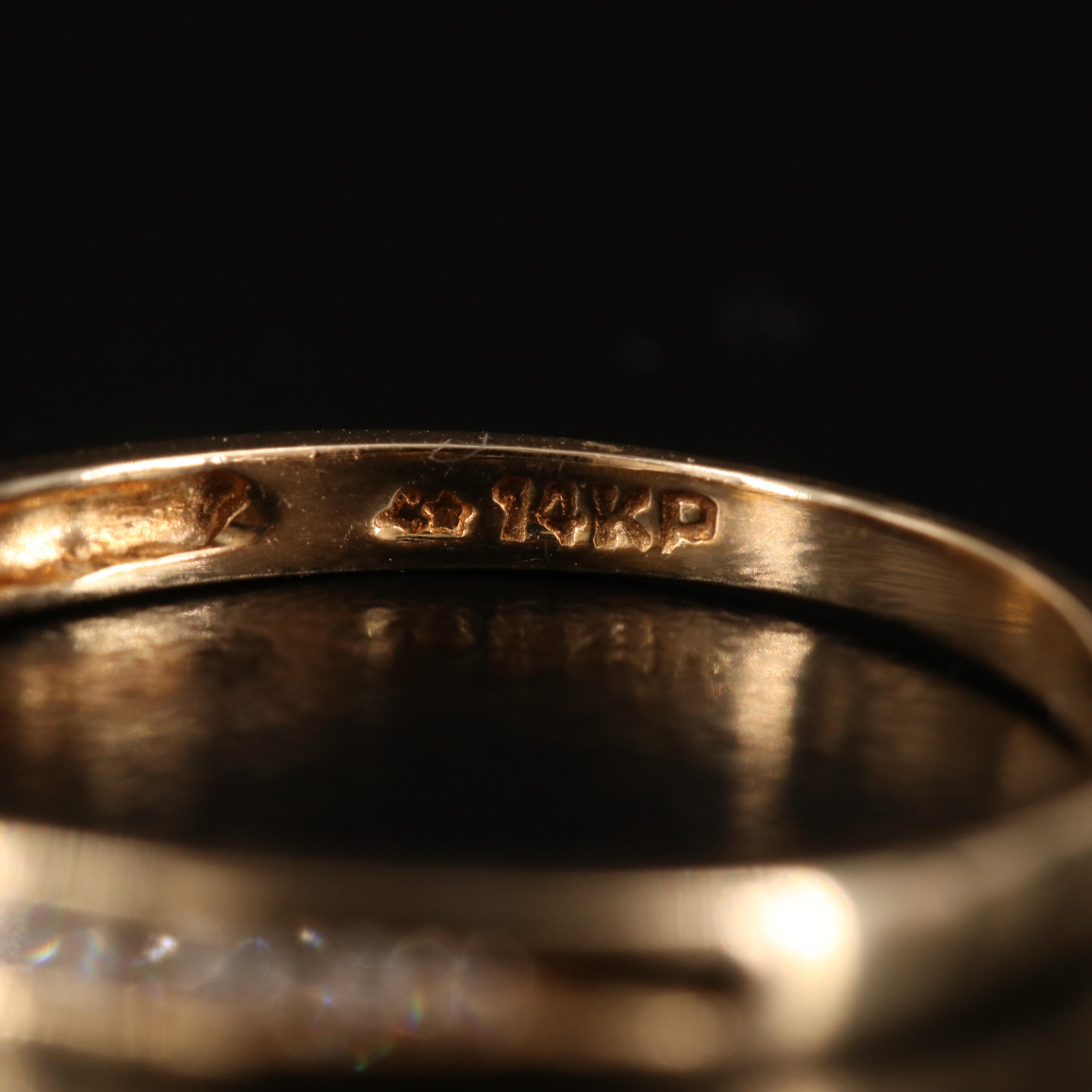 14K 0.10 CTW Diamond Channel Band