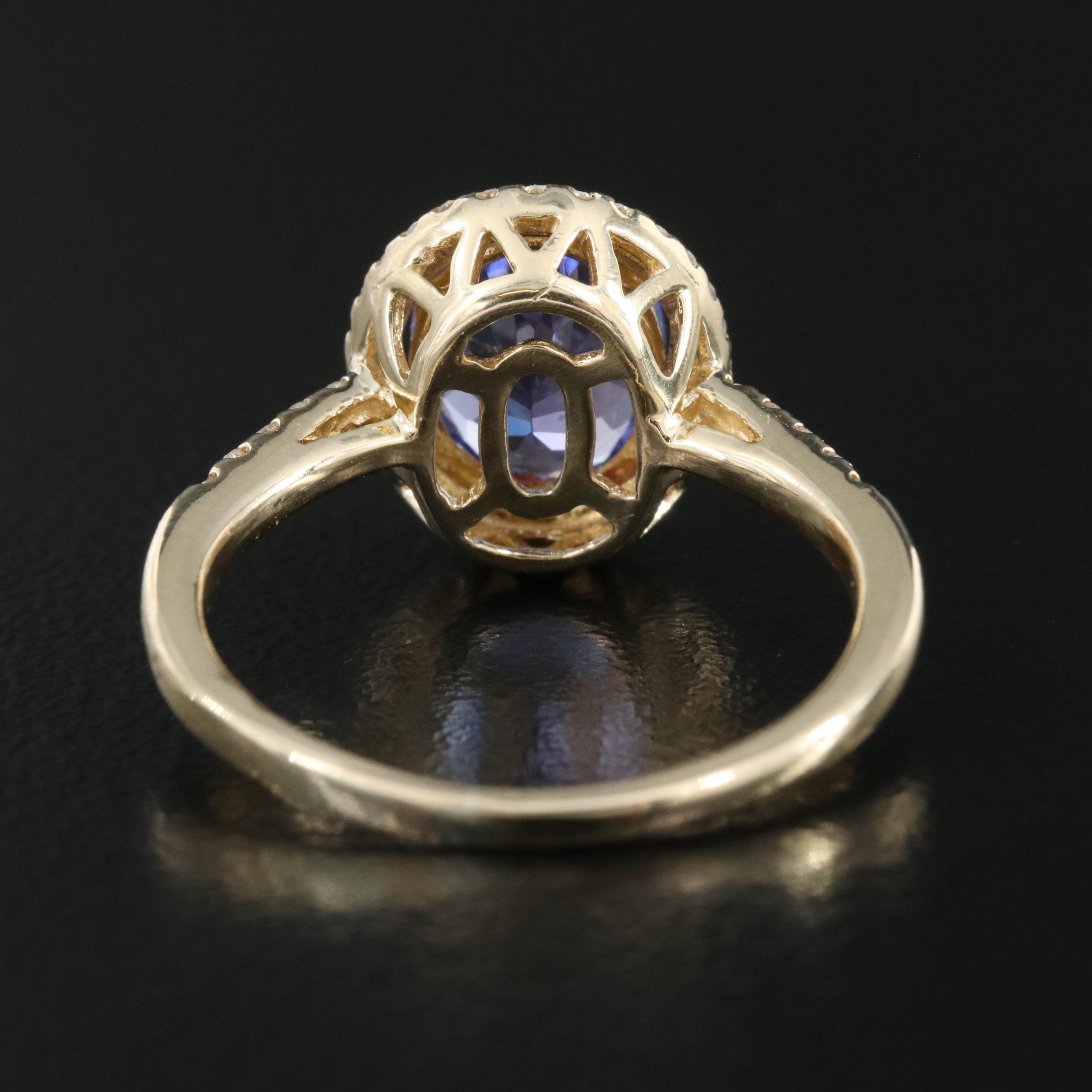 14K Tanzanite and Diamond Halo Ring