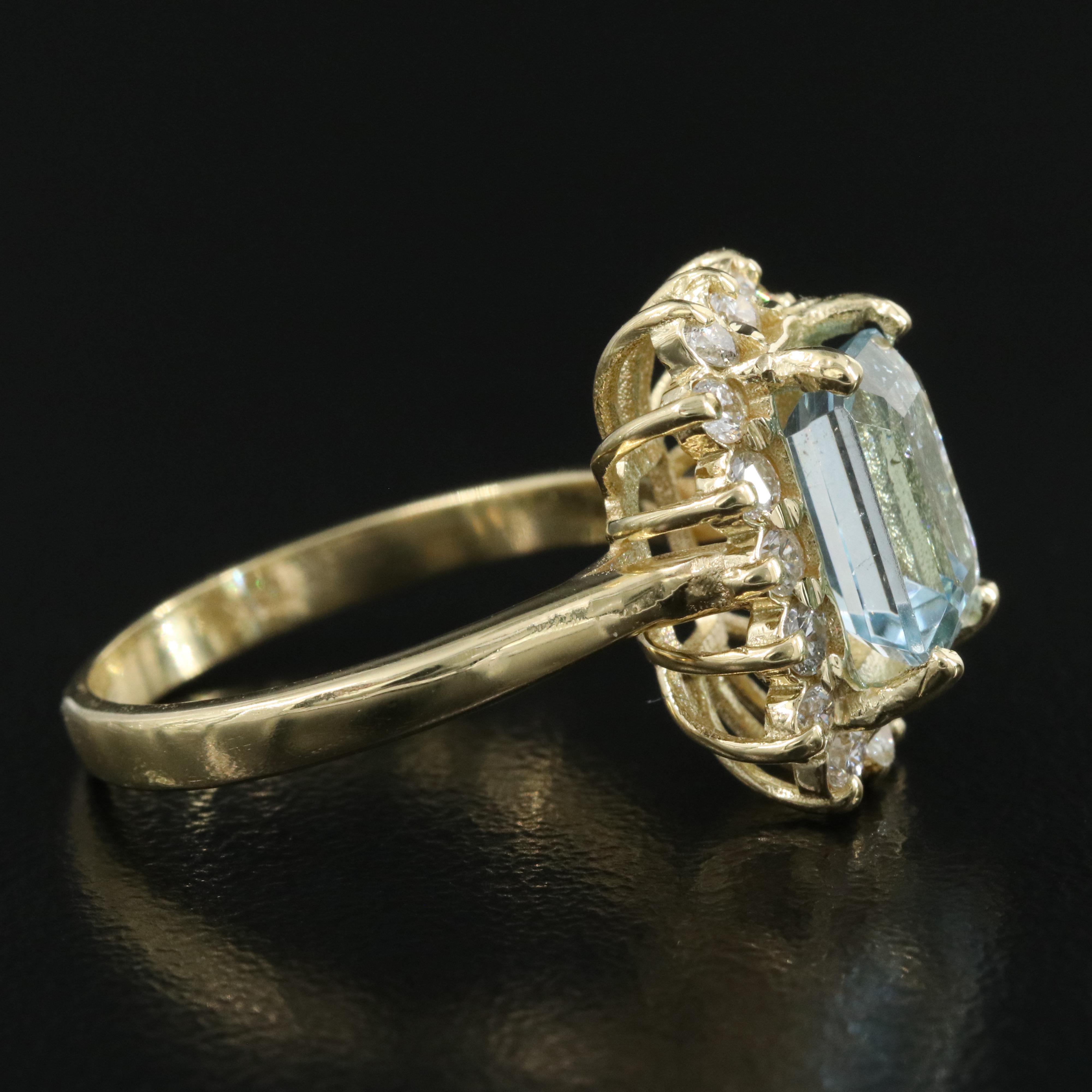 18K Aquamarine and Diamond Halo Ring