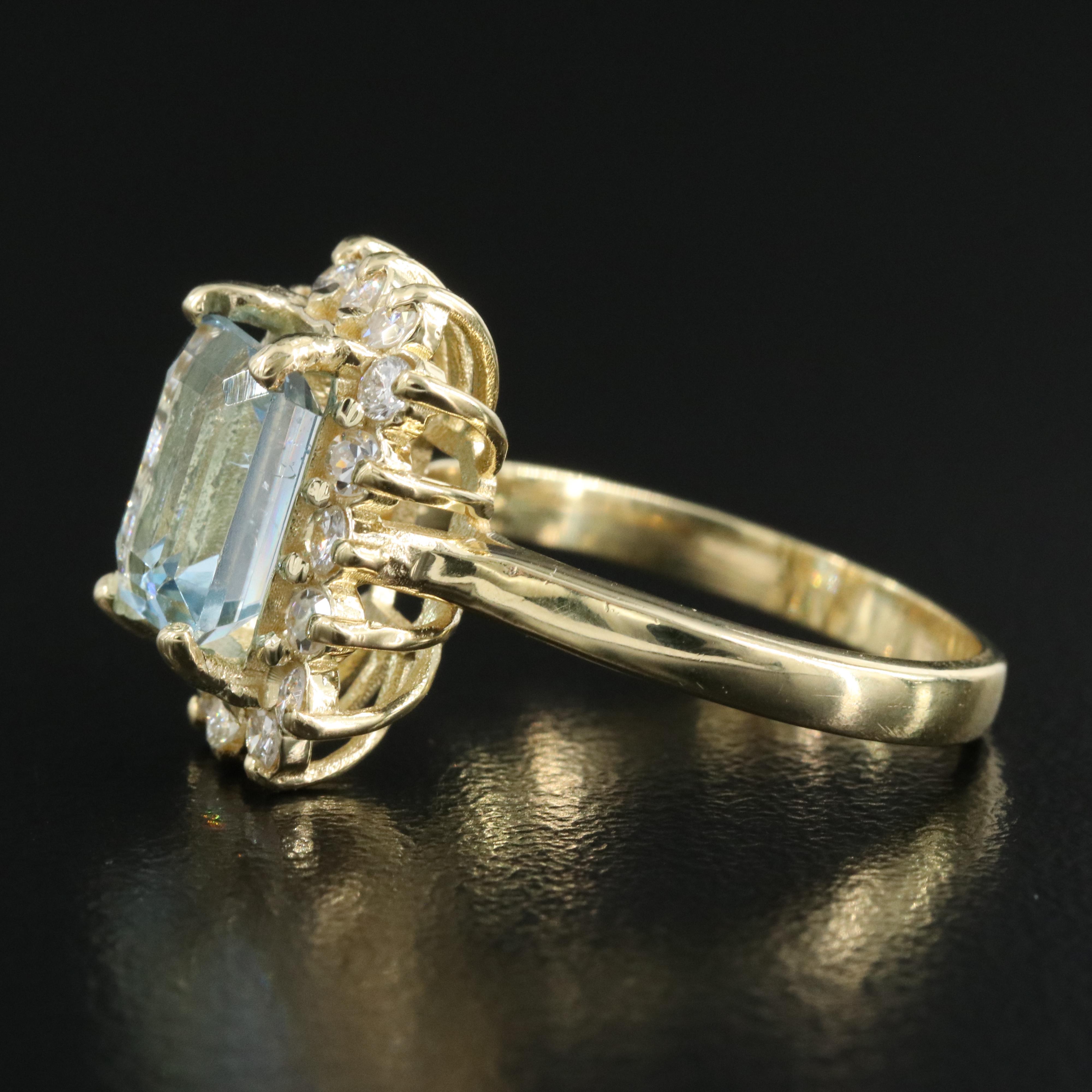 18K Aquamarine and Diamond Halo Ring