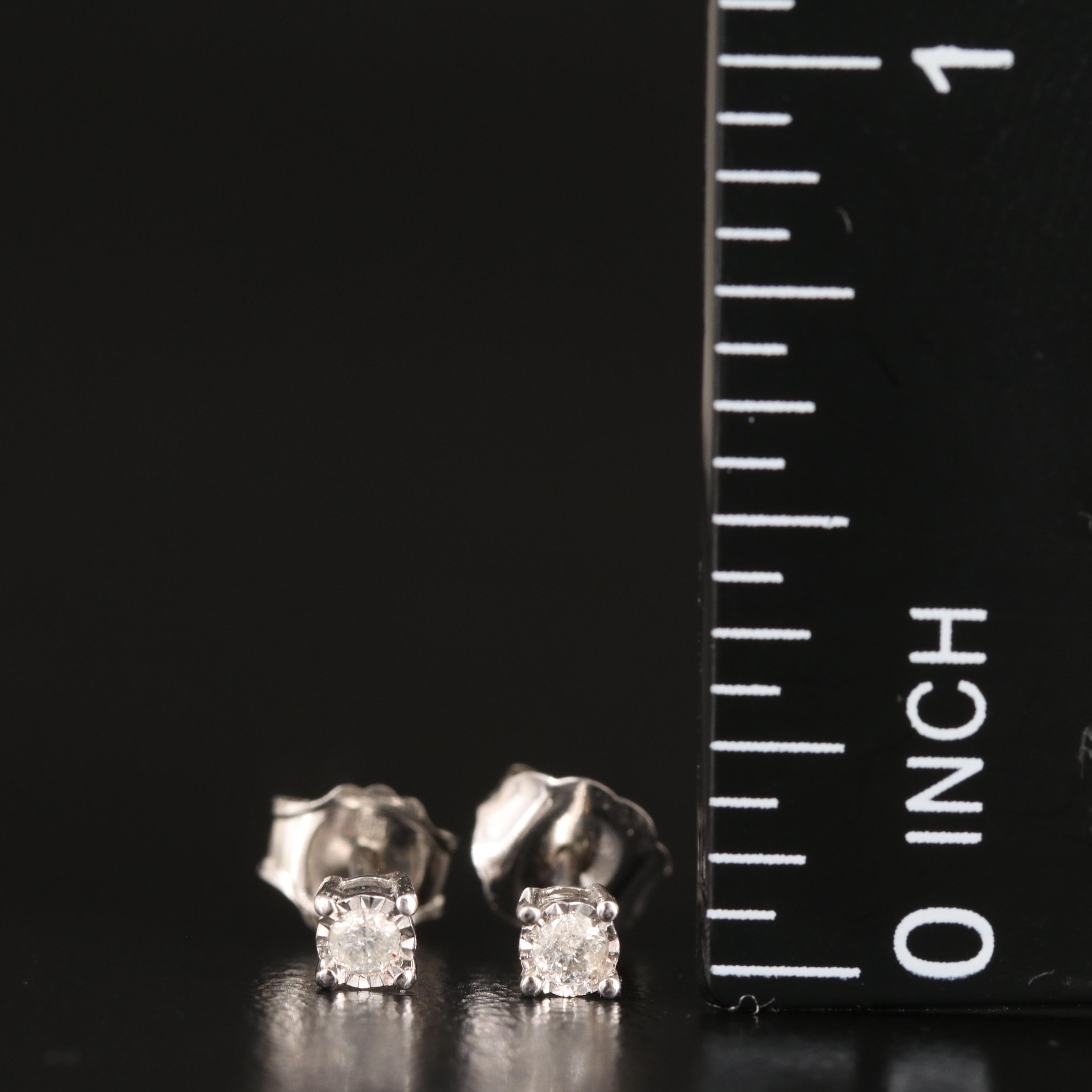 10K 0.06 CTW Diamond Stud Earrings