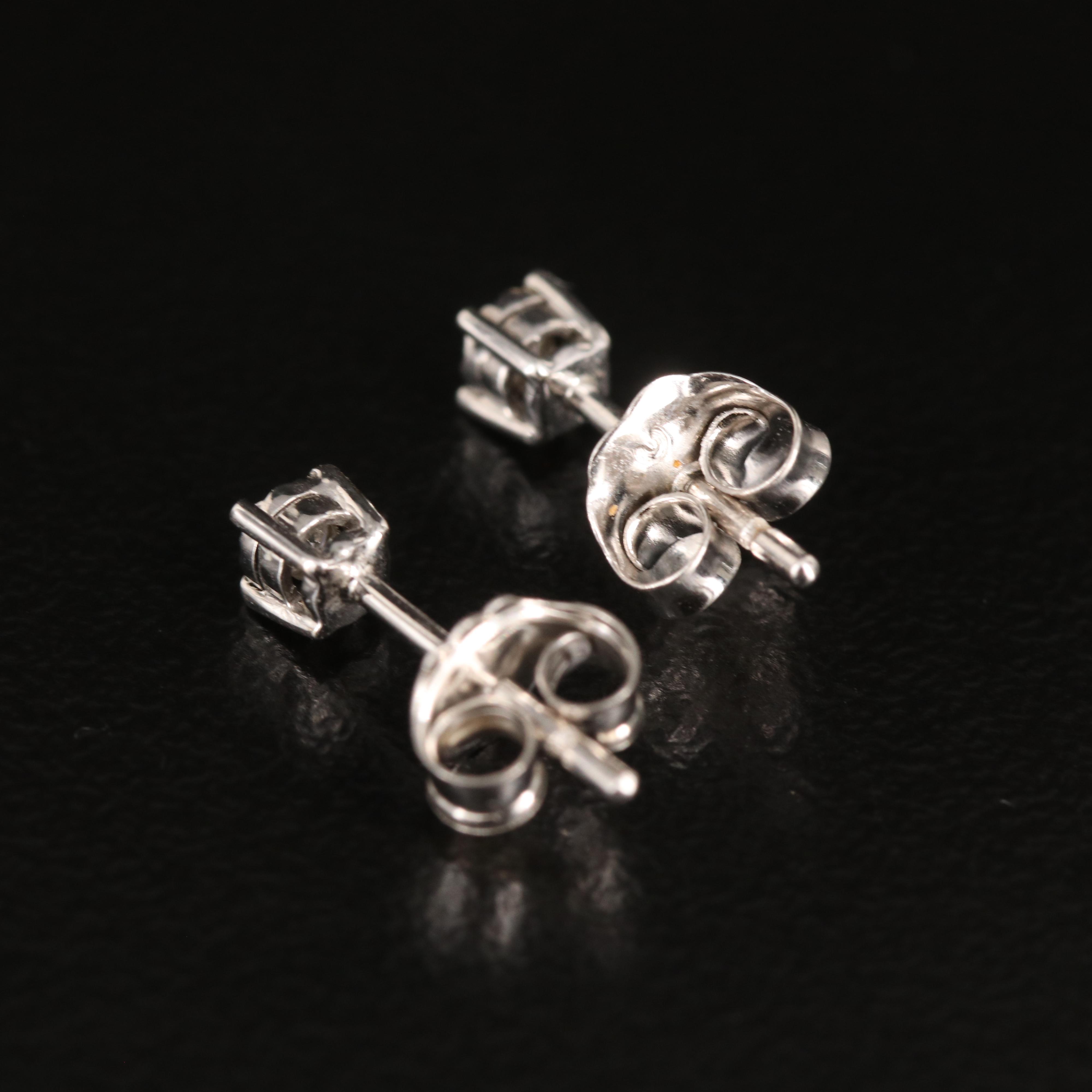 10K 0.06 CTW Diamond Stud Earrings