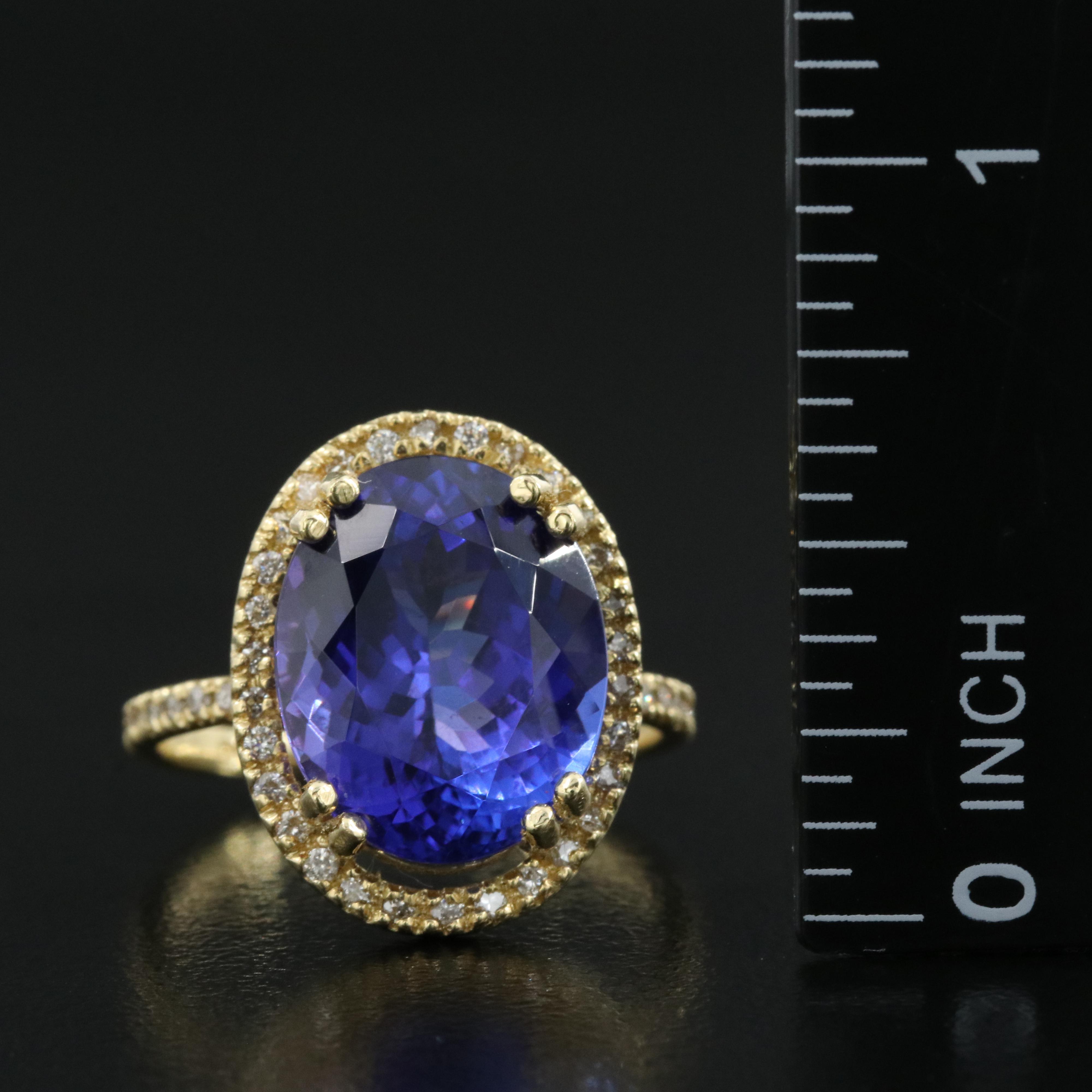 18K 8.52 CT Tanzanite and Diamond Halo Ring