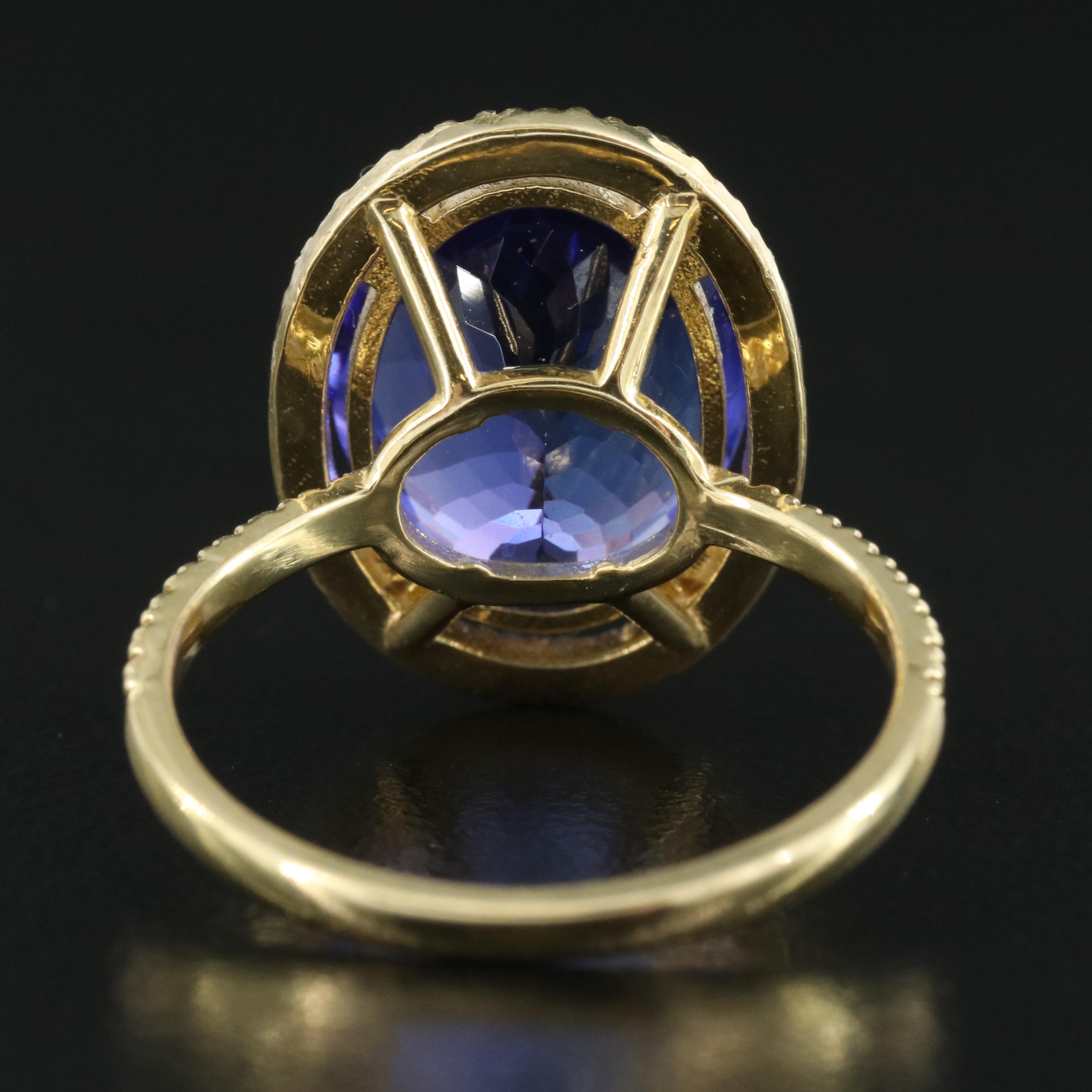 18K 8.52 CT Tanzanite and Diamond Halo Ring