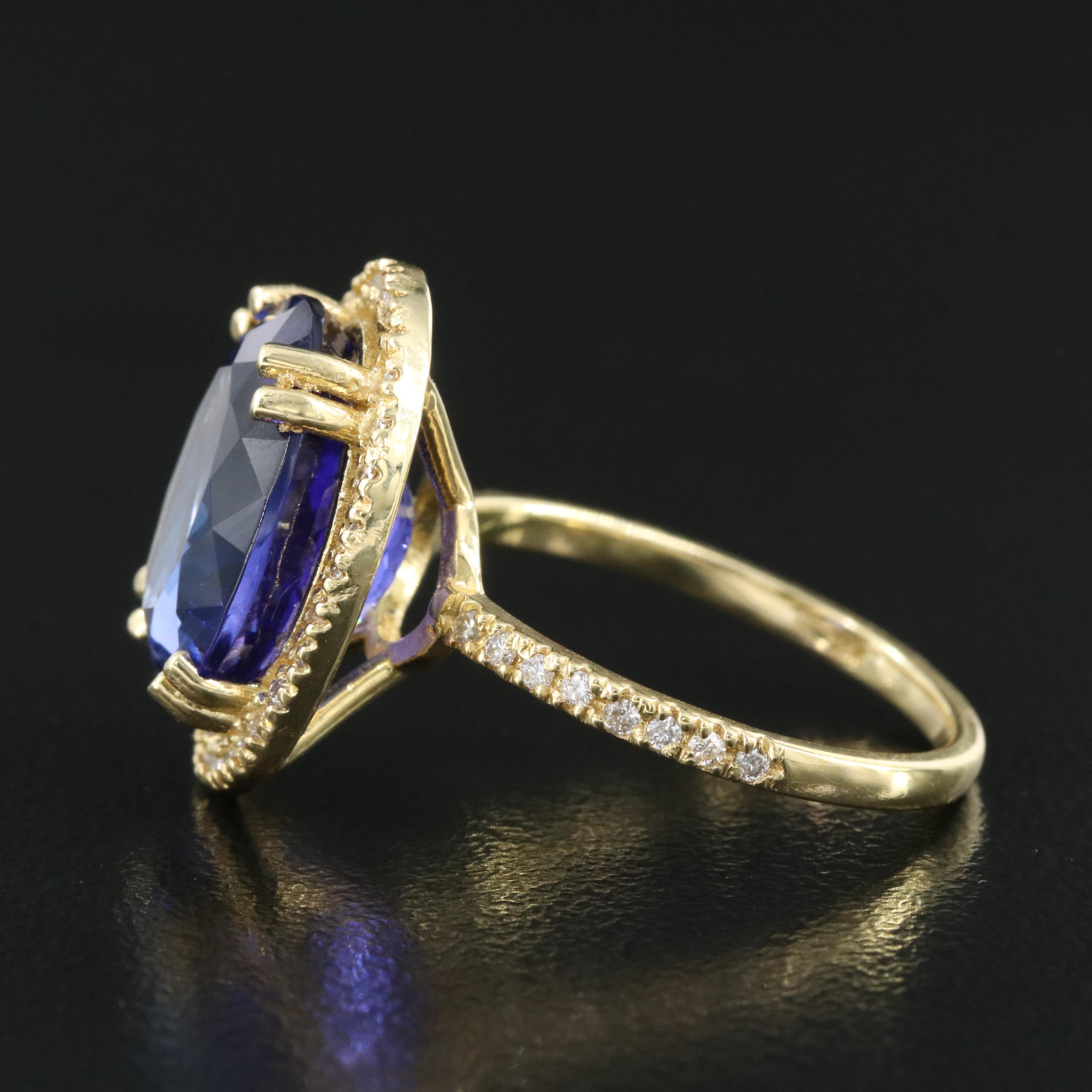 18K 8.52 CT Tanzanite and Diamond Halo Ring