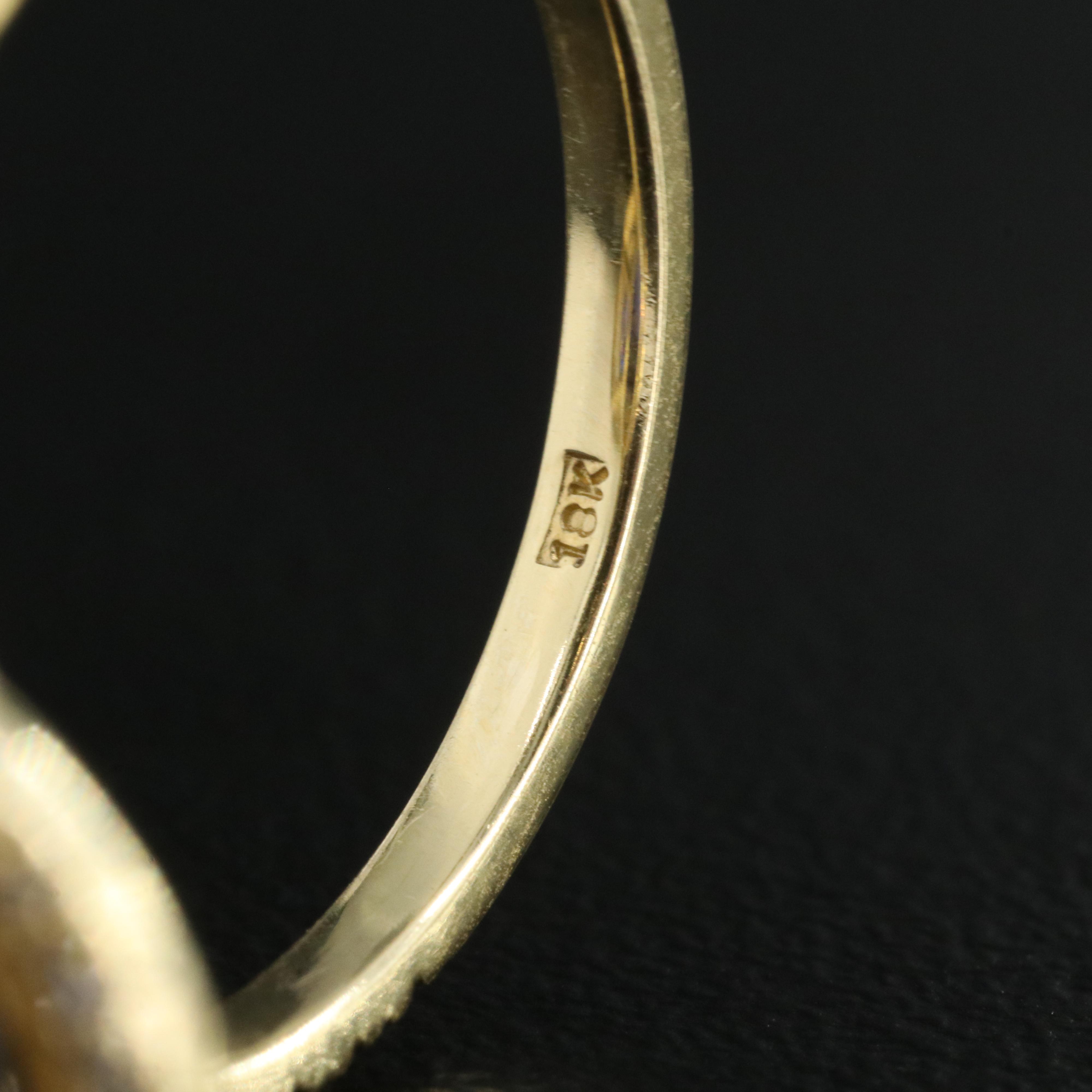 18K 8.52 CT Tanzanite and Diamond Halo Ring