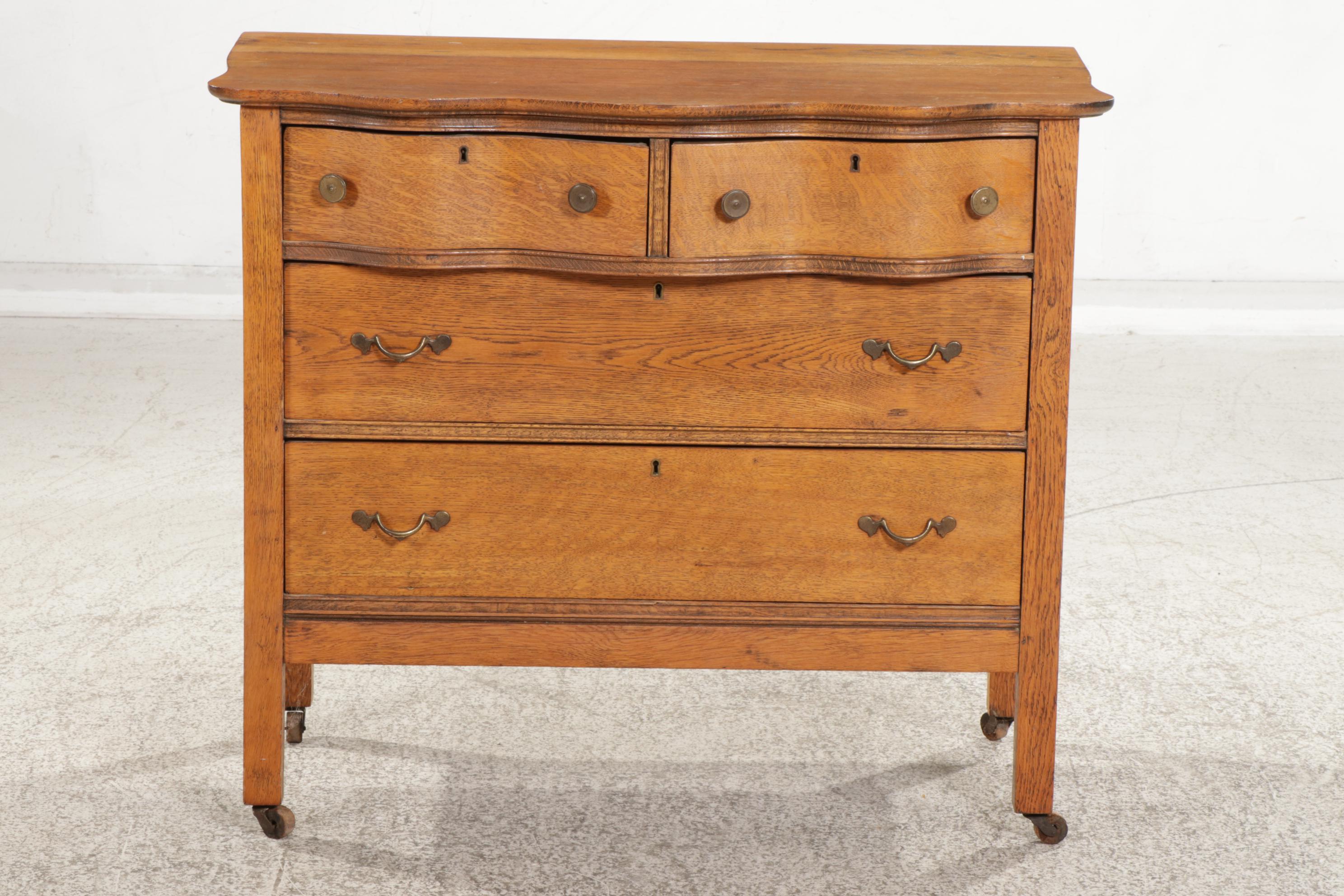Late Victorian Oak Serpentine-Front Four-Drawer Chest