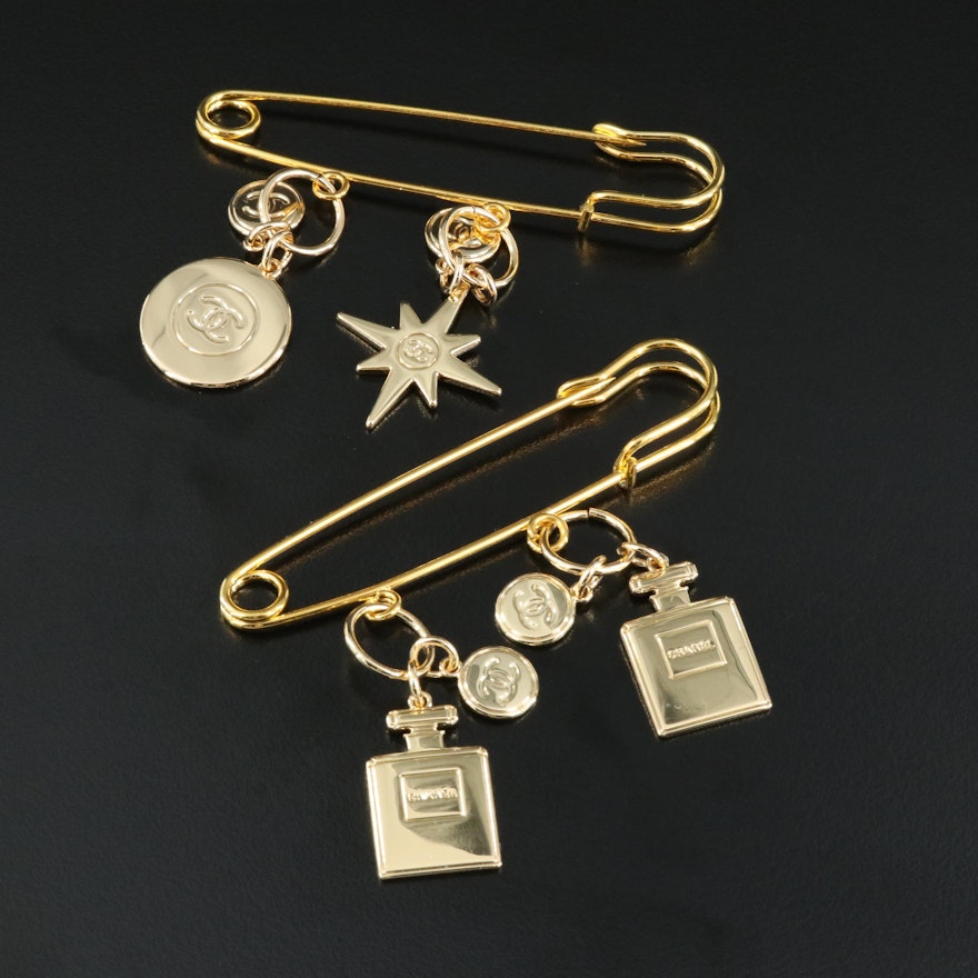 Chanel 2022 Holiday Charms Pins Including Perfume Bottles, Star and Globe