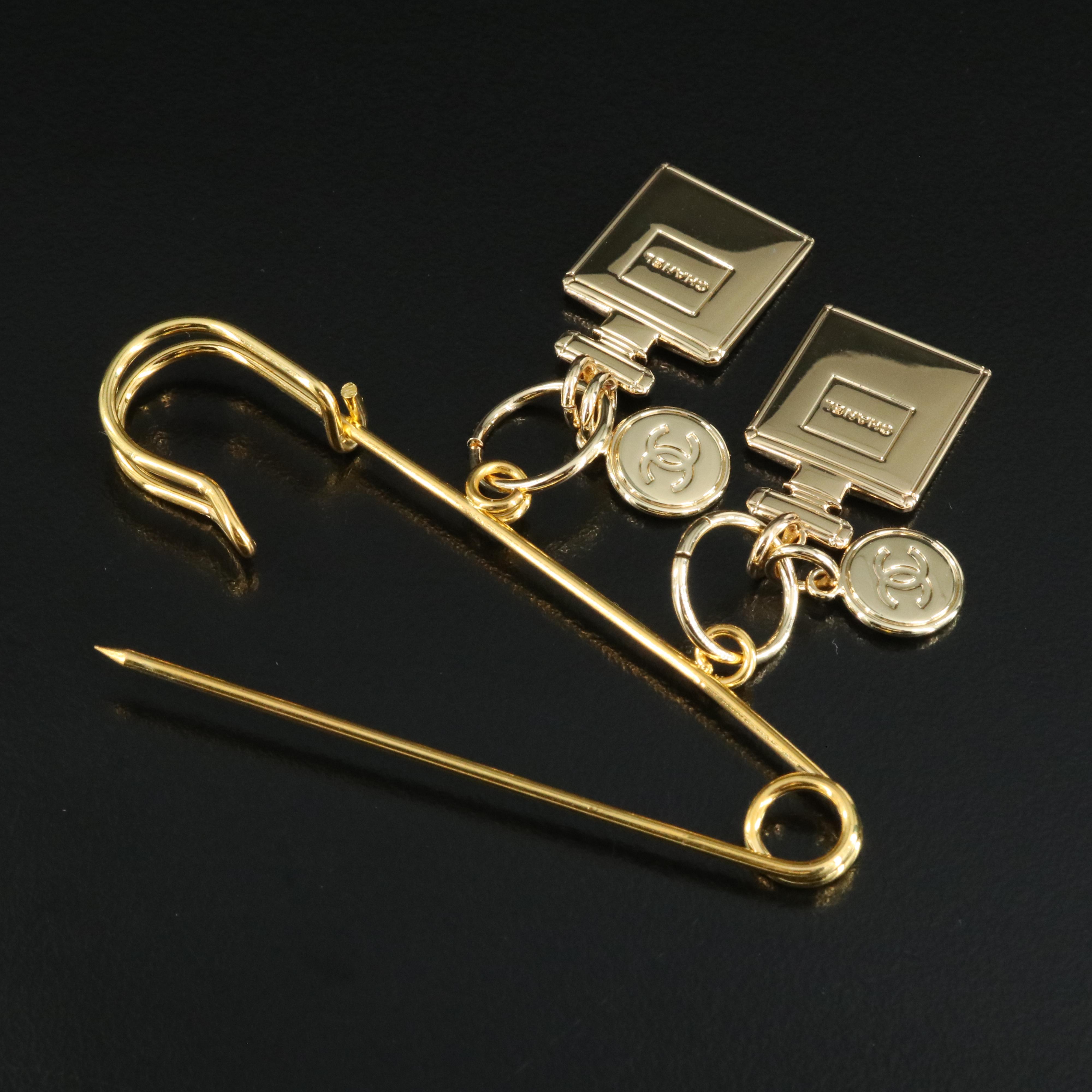 Chanel 2022 Holiday Charms Pins Including Perfume Bottles, Star and Globe