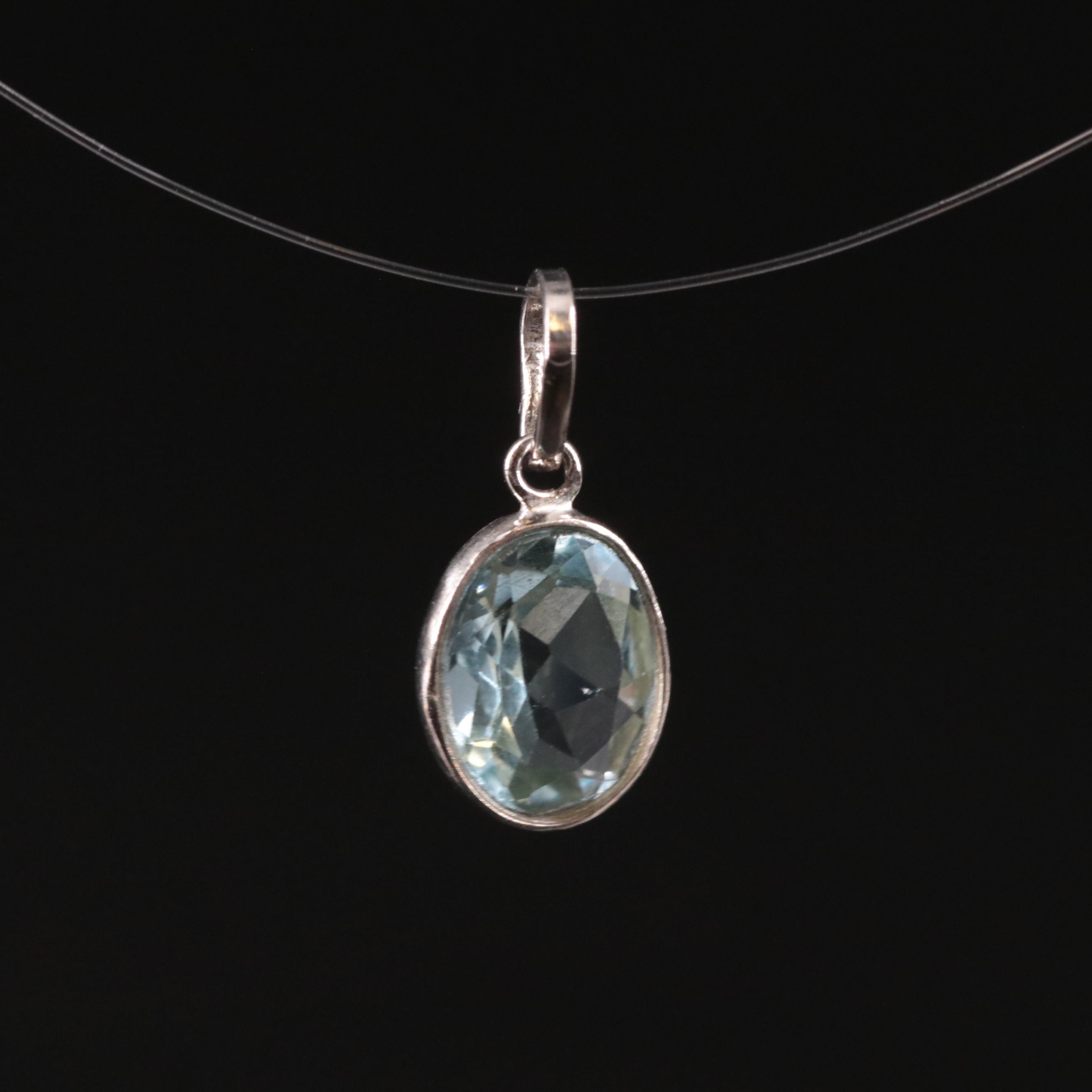 14K Blue Topaz Pendant