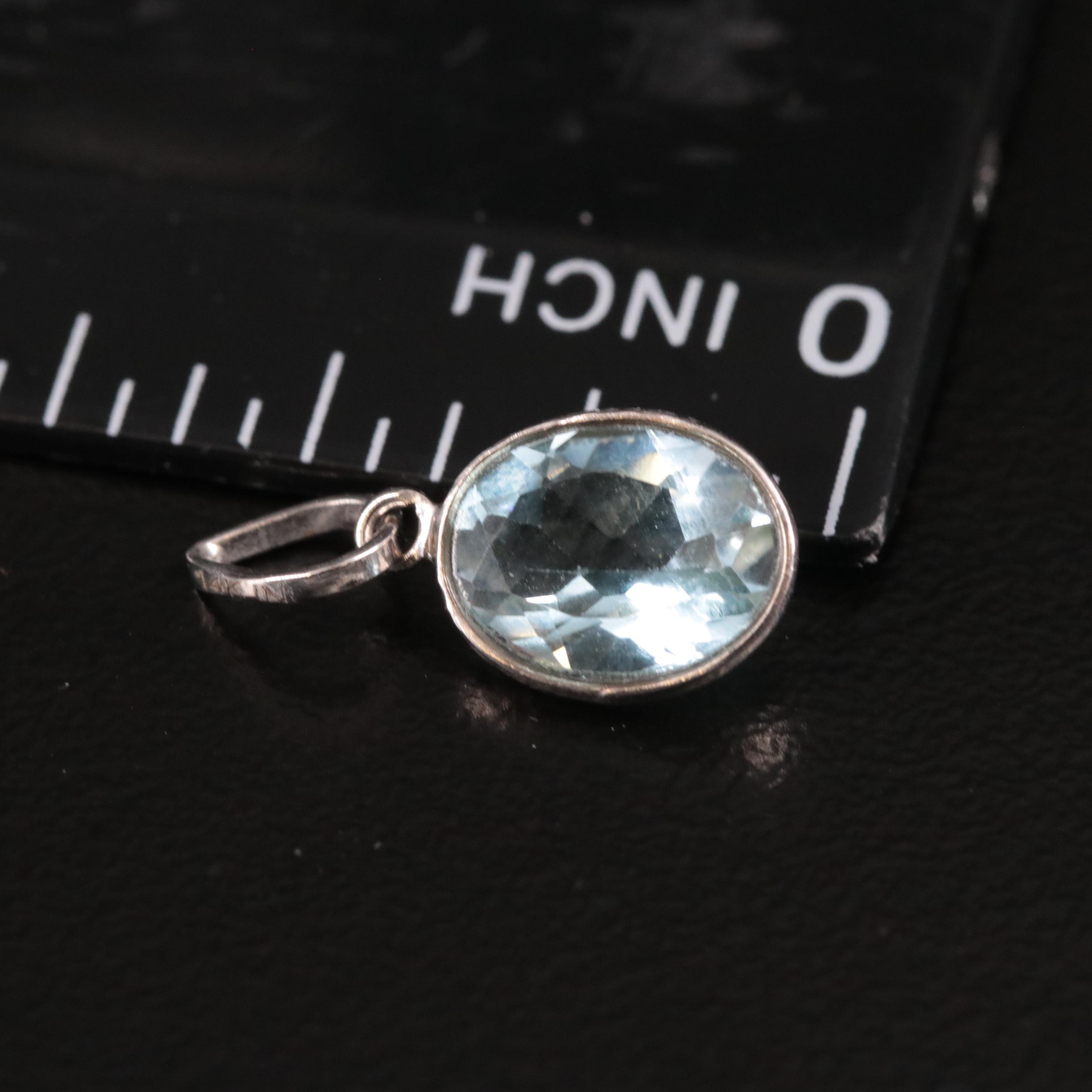 14K Blue Topaz Pendant