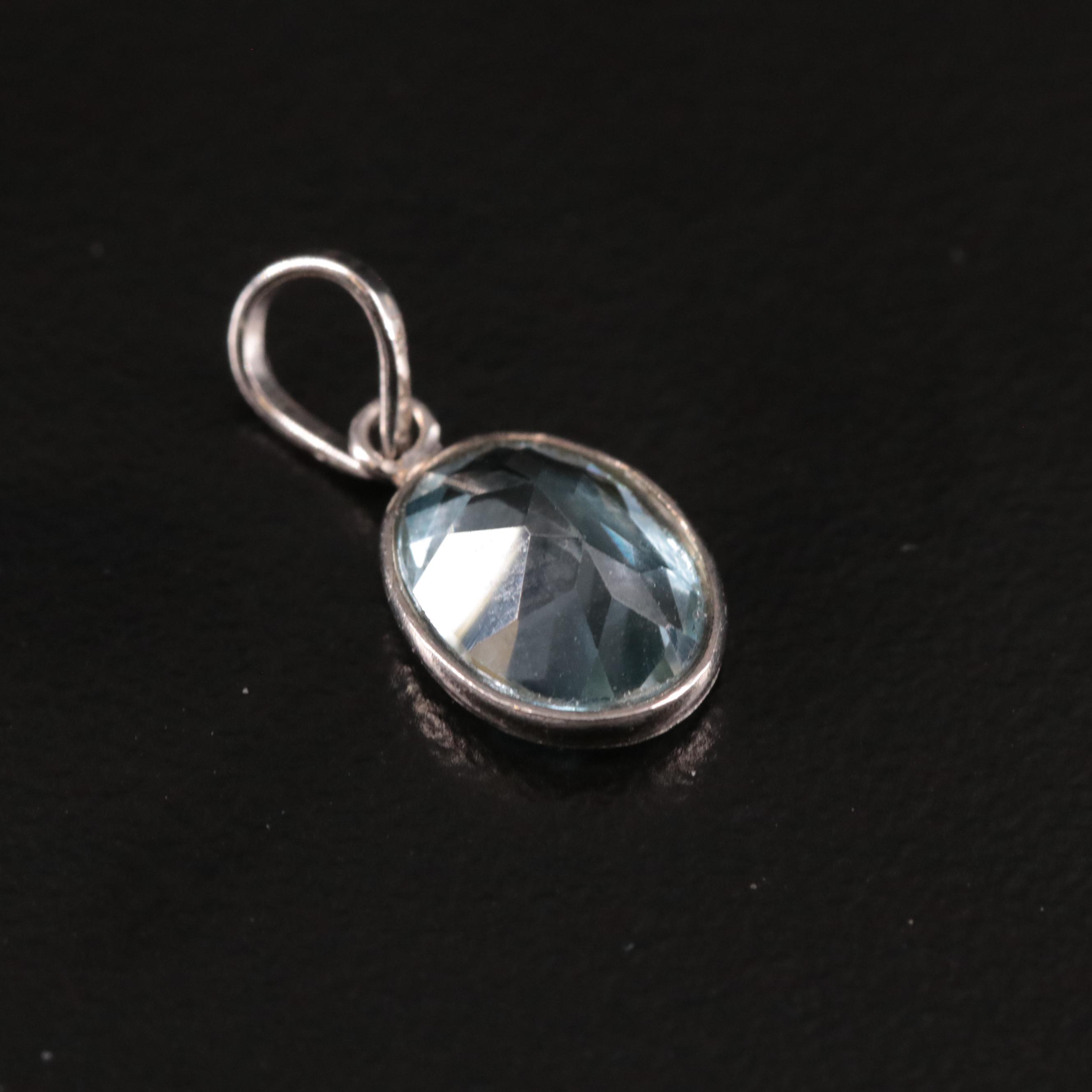 14K Blue Topaz Pendant