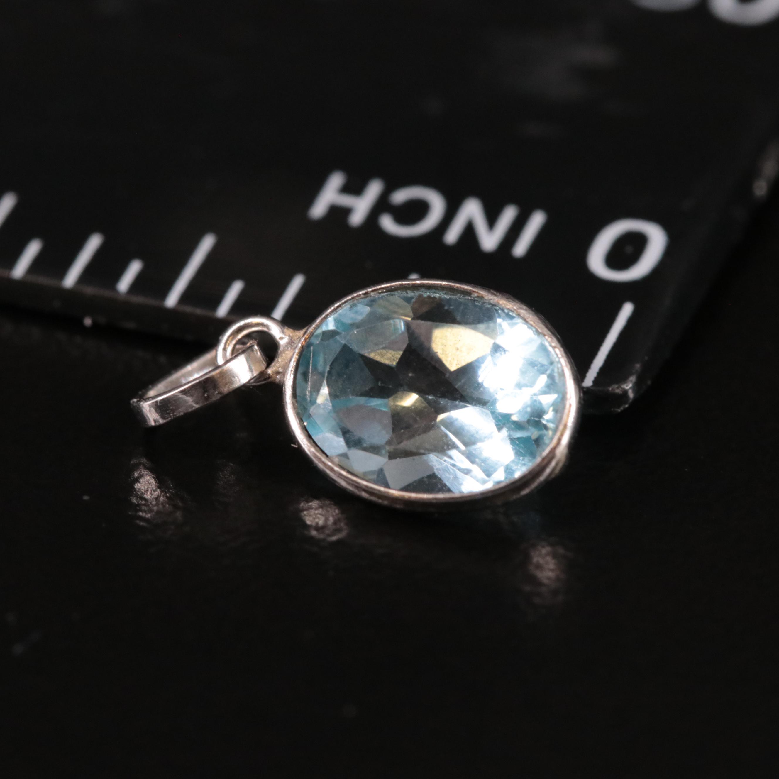 14K Blue Topaz Pendant