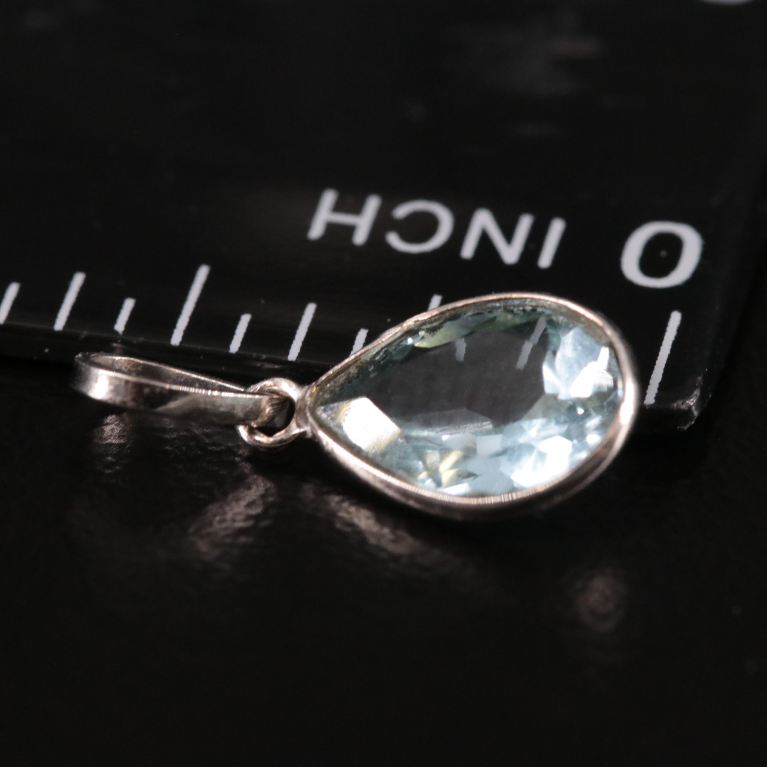 14K Blue Topaz Pendant