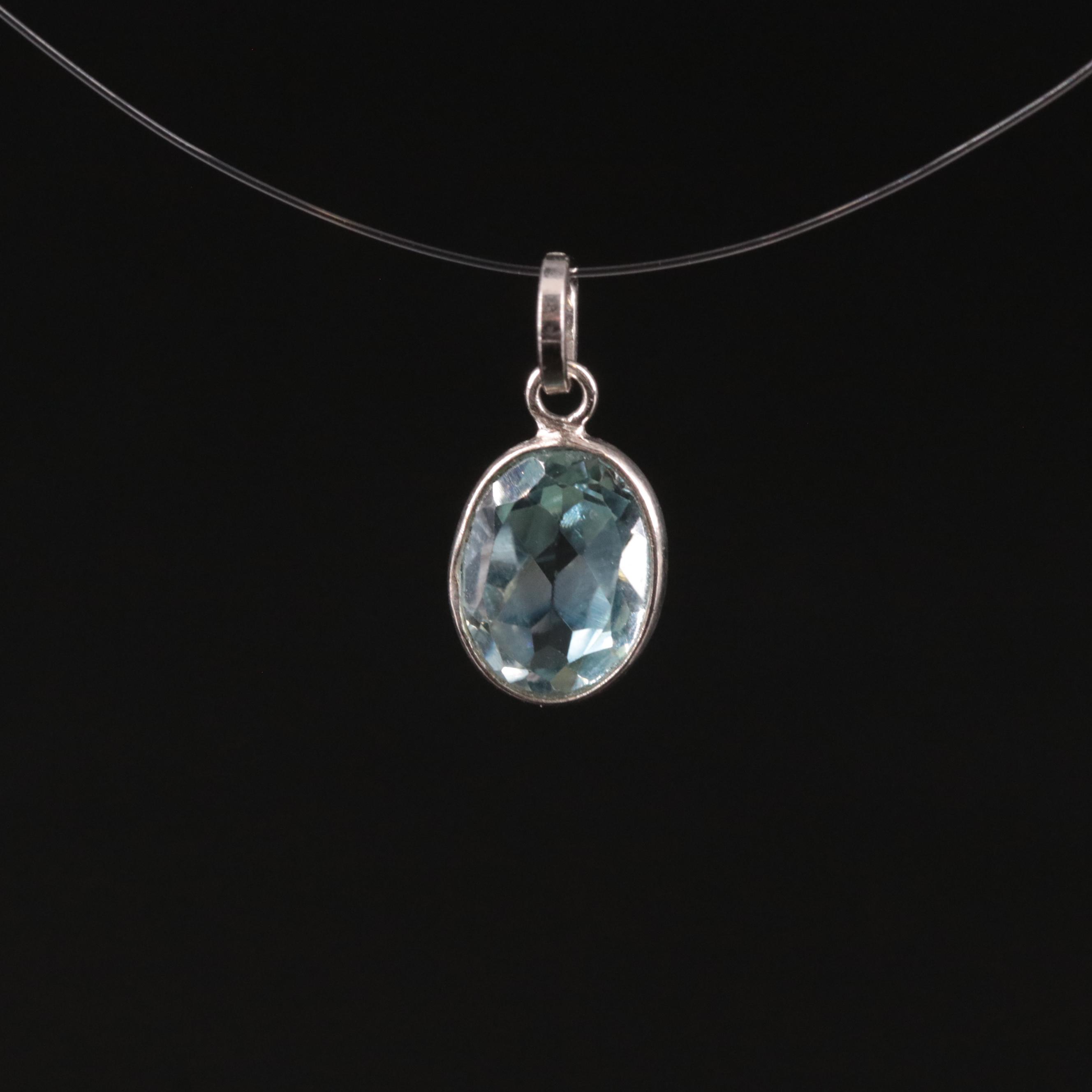14K Blue Topaz Pendant