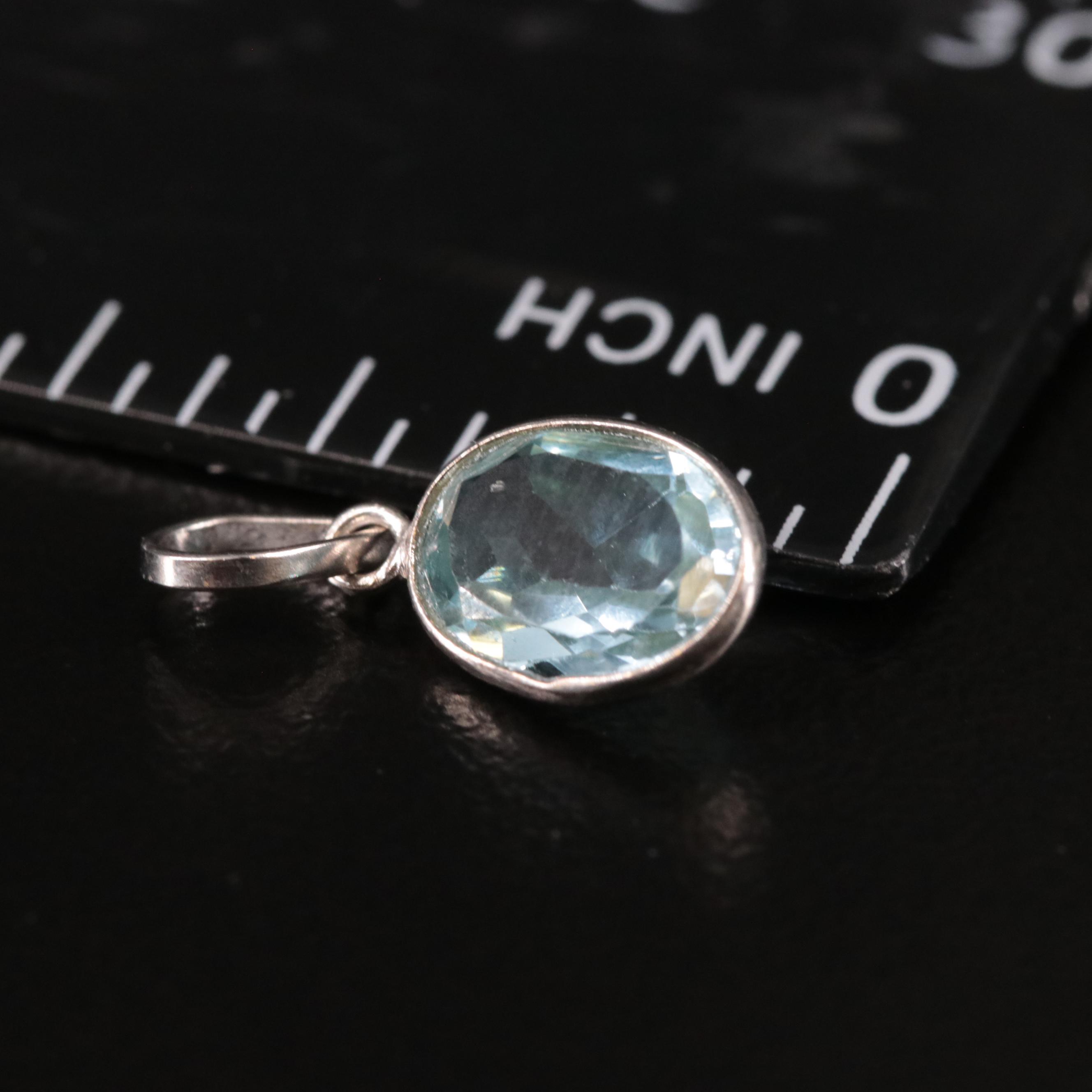 14K Blue Topaz Pendant