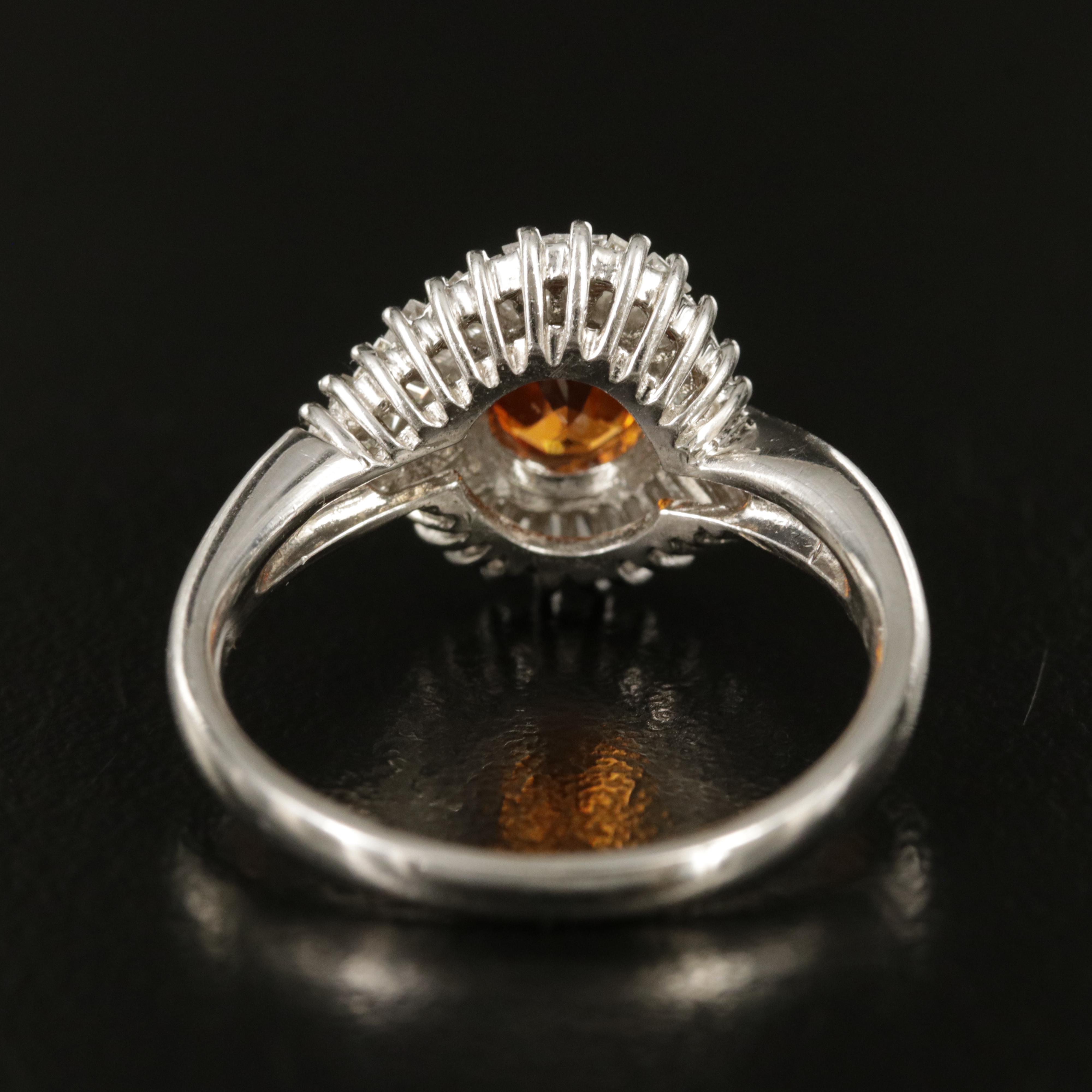 Platinum Garnet and Diamond Ring