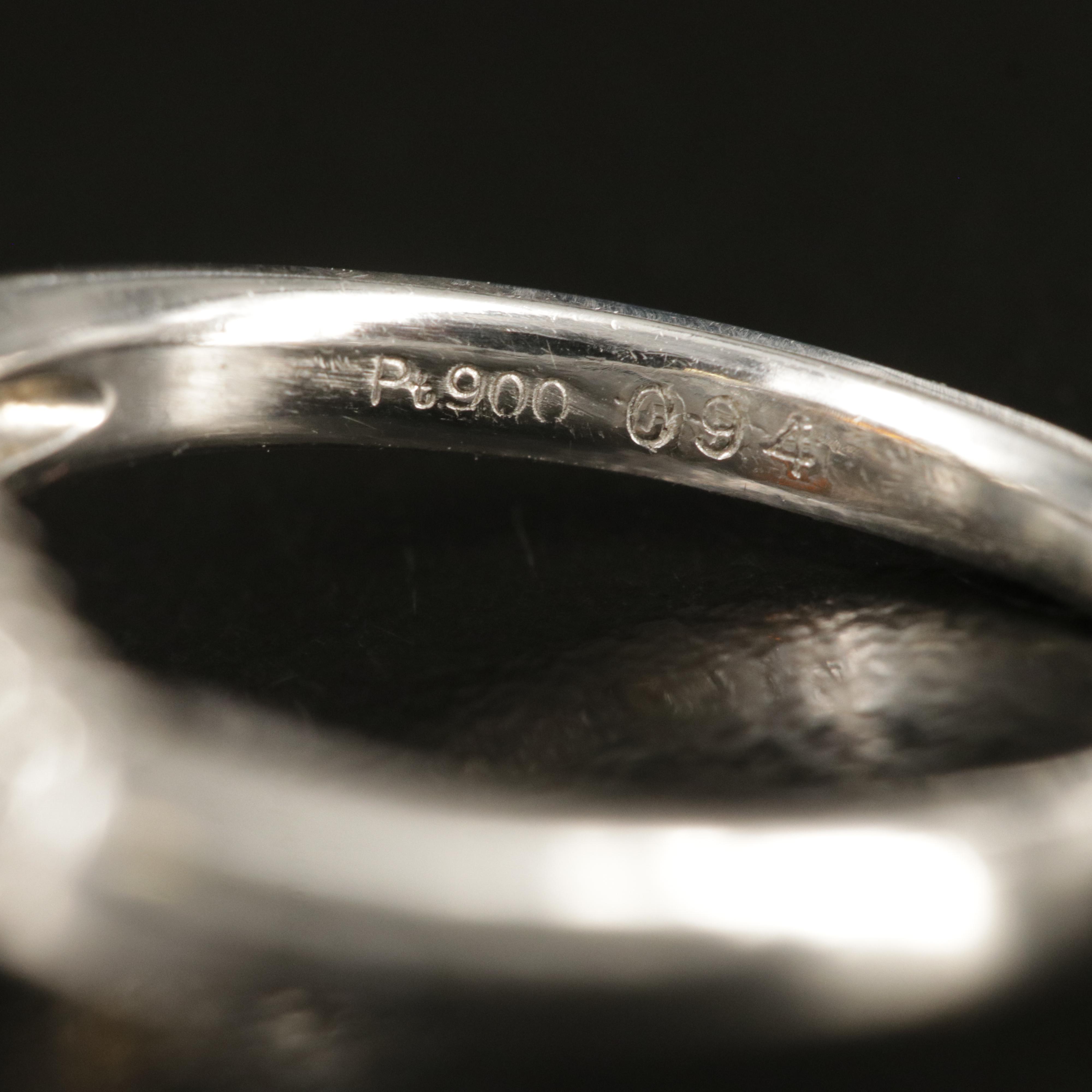 Platinum Garnet and Diamond Ring