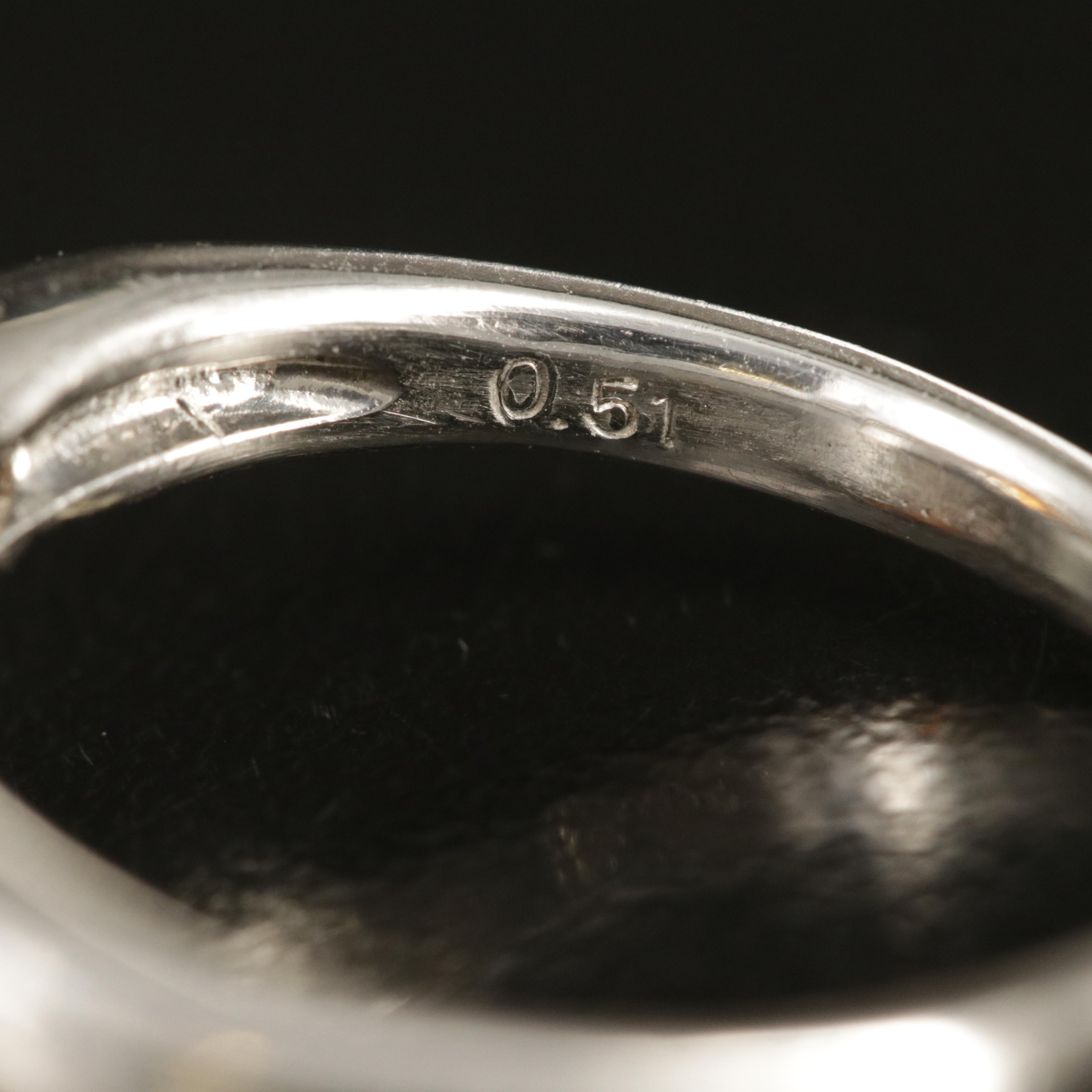 Platinum Garnet and Diamond Ring