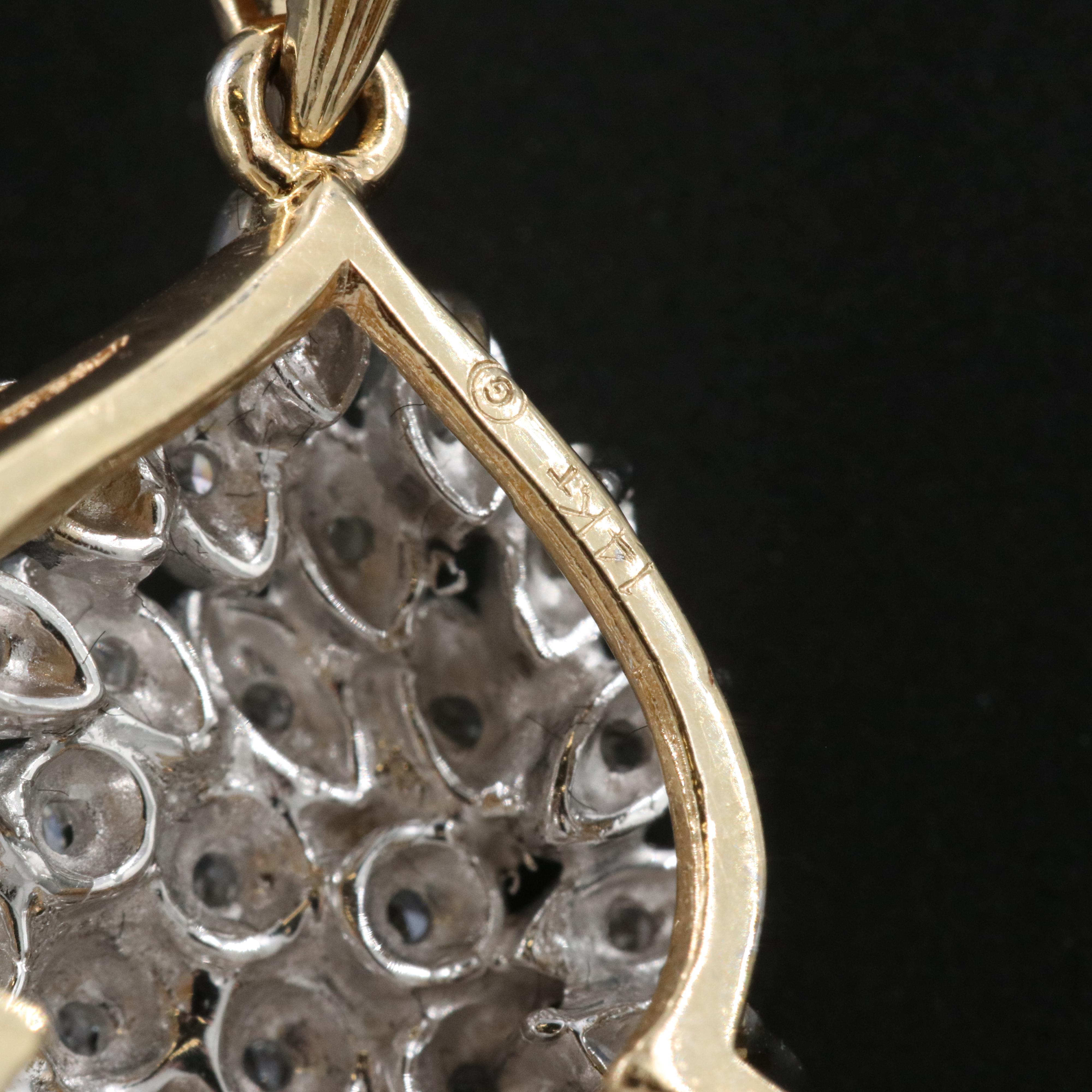 14K 0.43 CTW Diamond Cluster Pendant on Serpentine Chain