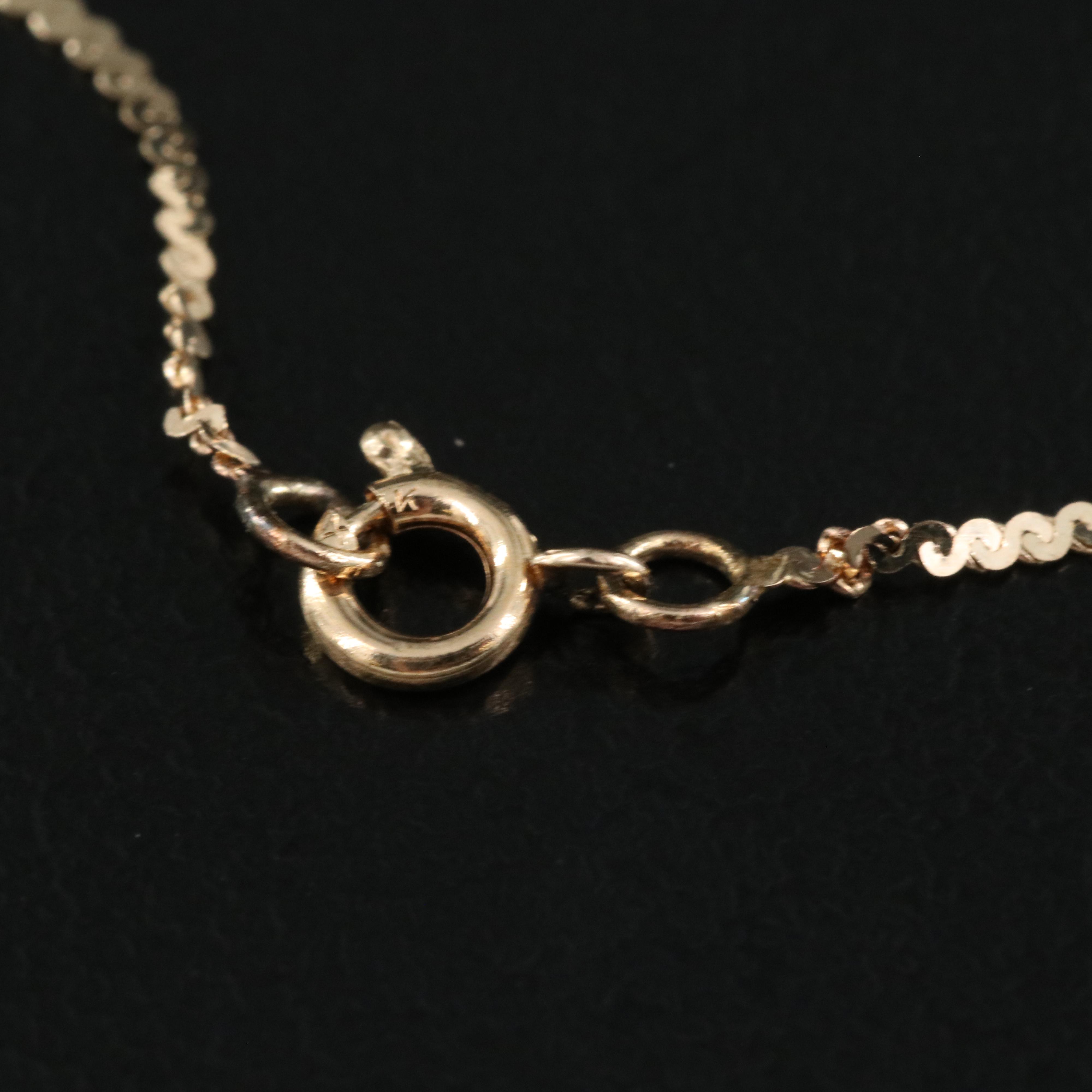 14K 0.43 CTW Diamond Cluster Pendant on Serpentine Chain