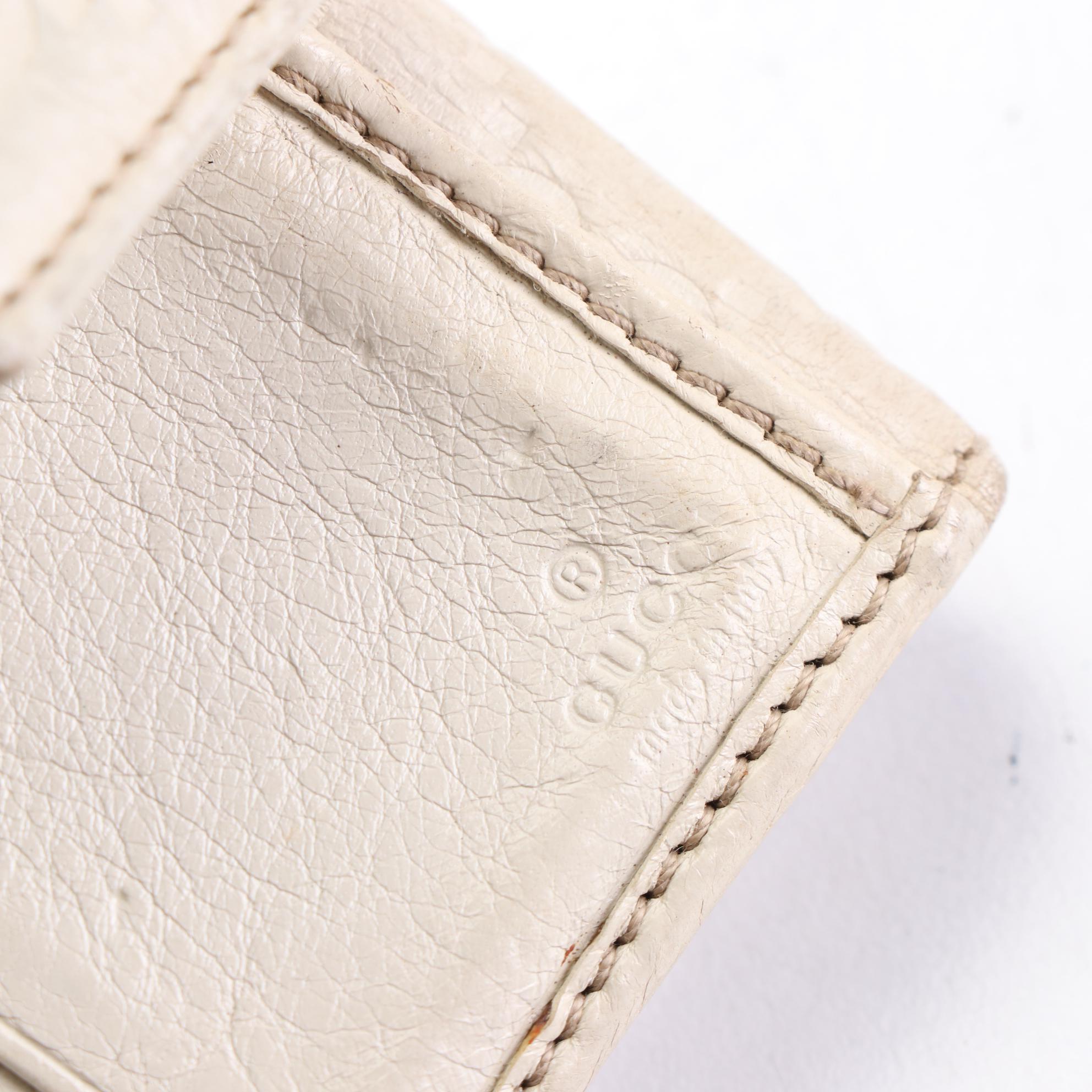 Gucci Compact Wallet in Guccissima Leather with GG Charm