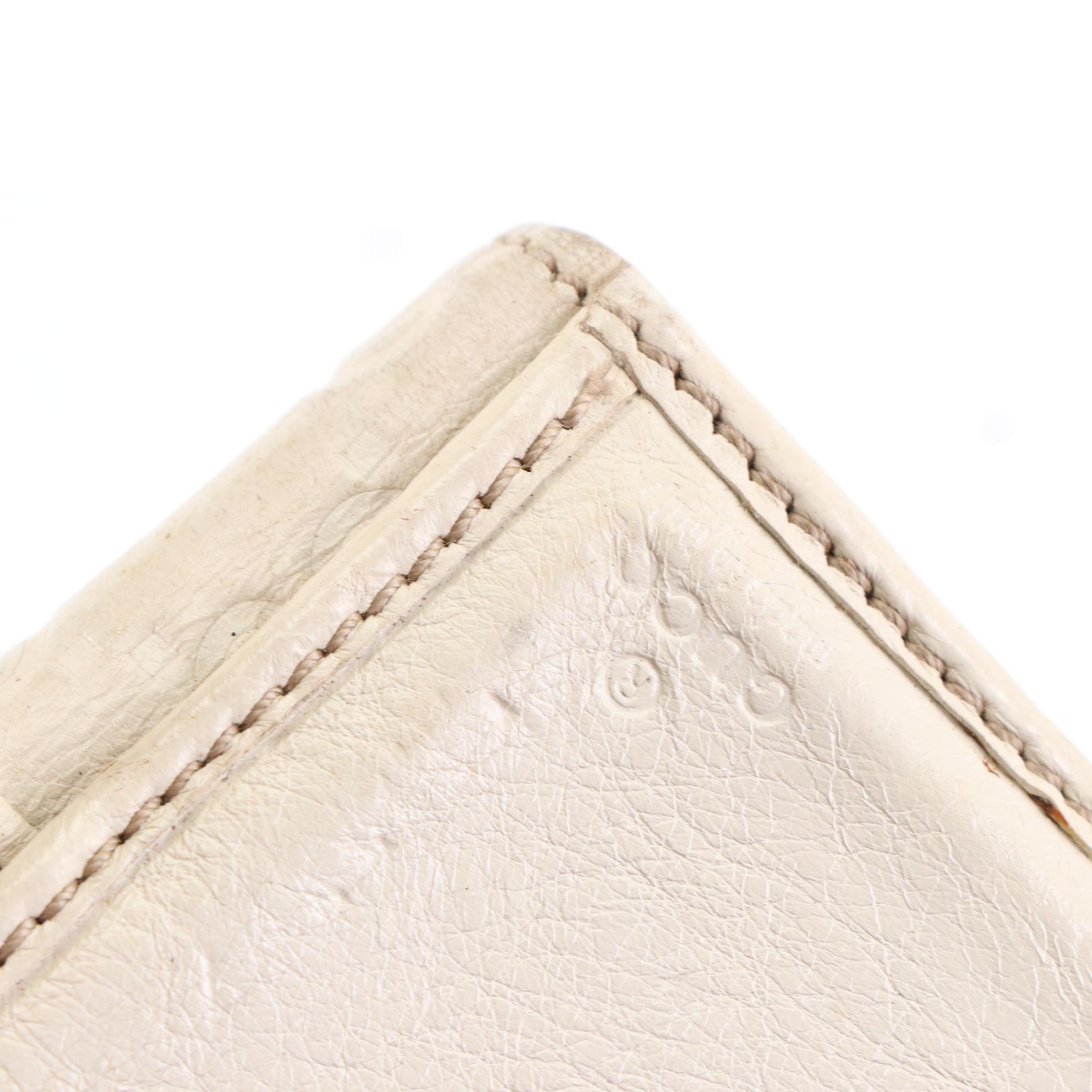 Gucci Compact Wallet in Guccissima Leather with GG Charm