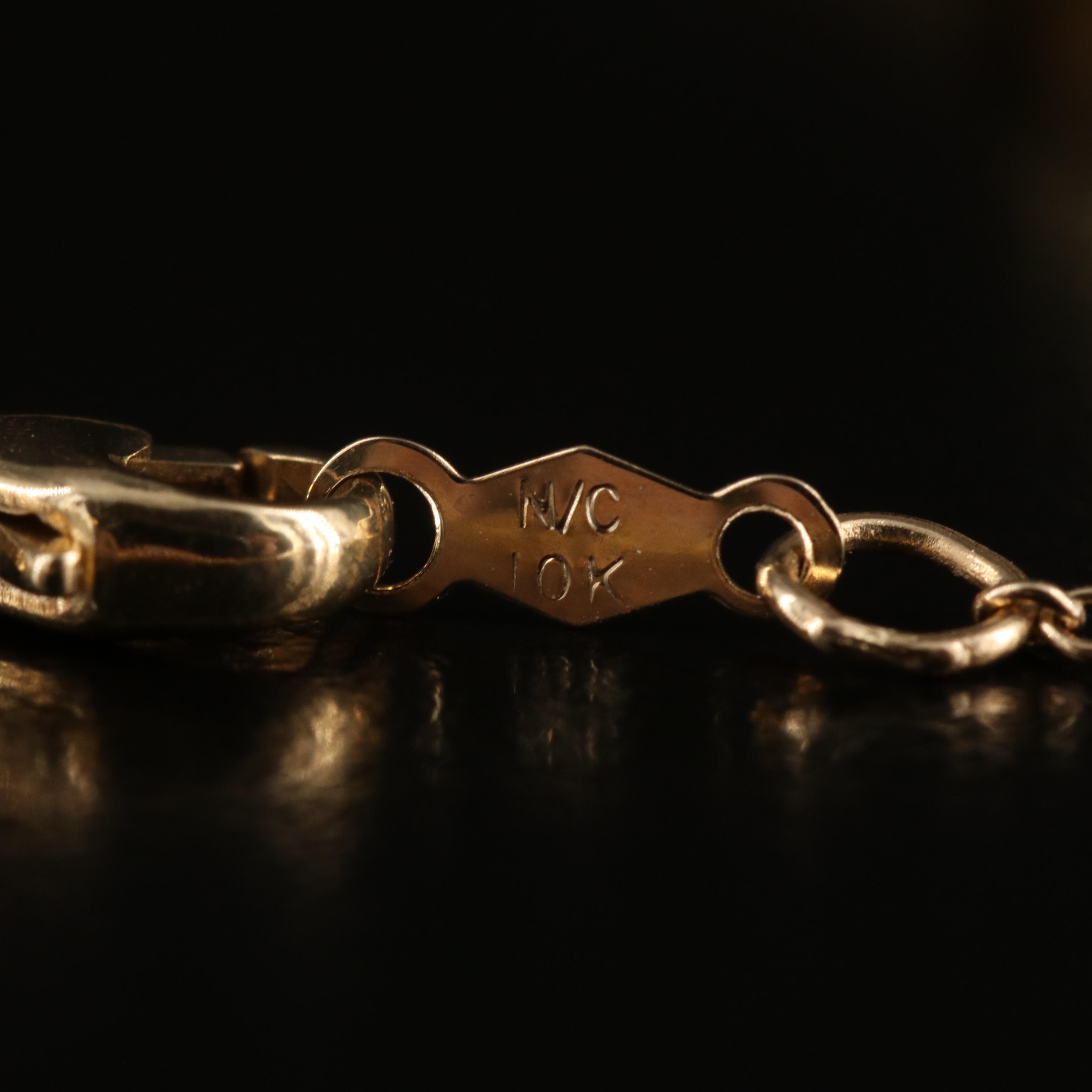 10K 0.03 CTW Diamond Bow Ring on Chain Necklace