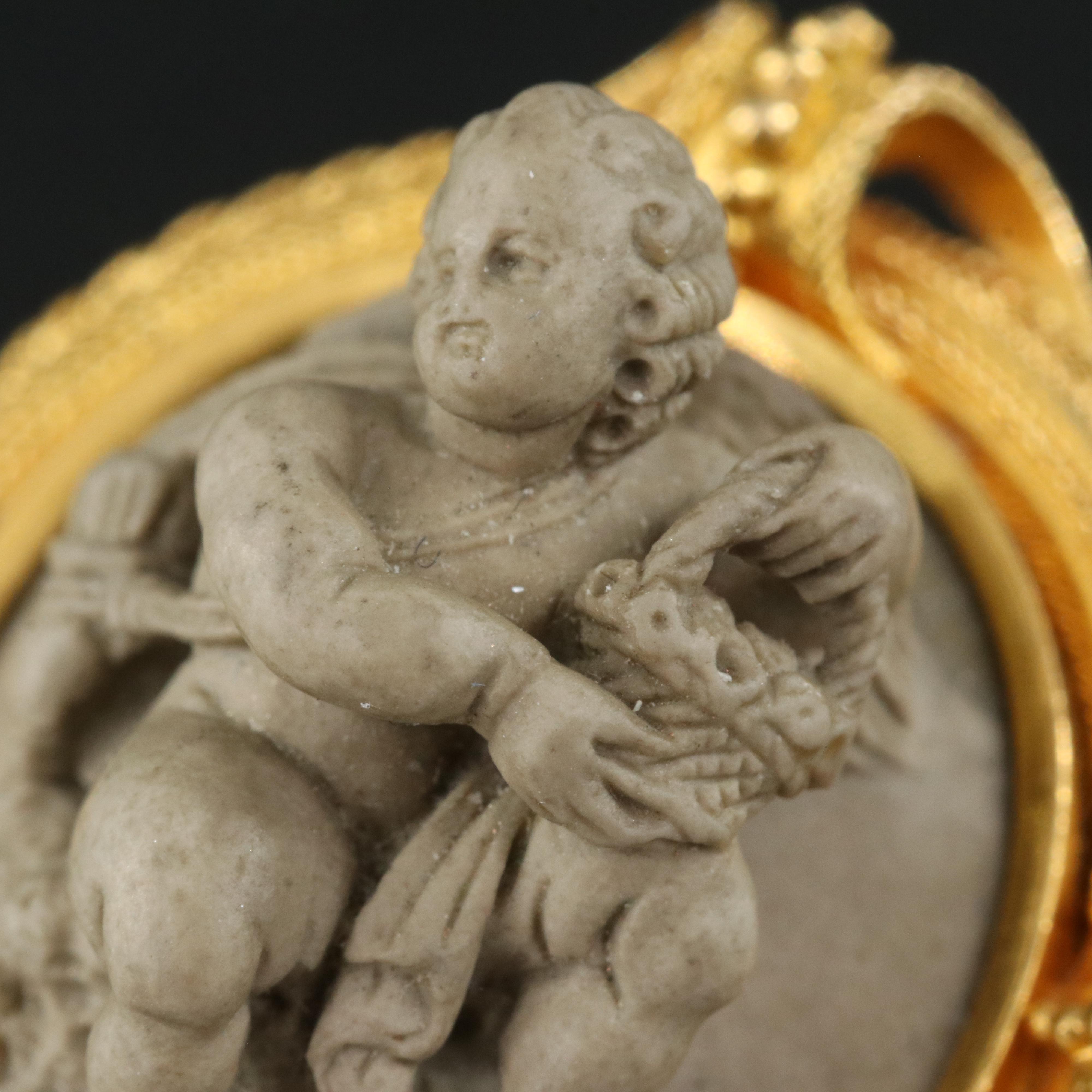 Etruscan Revival 14K Lava Cupid Brooch