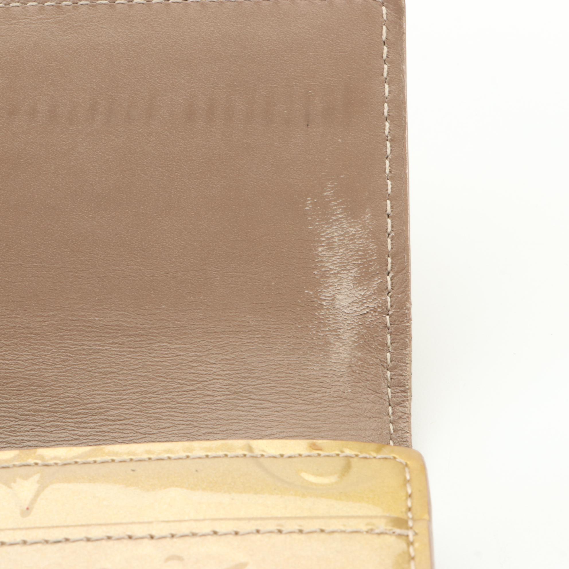 Louis Vuitton Portefeuille Sarah Wallet in Monogram Vernis