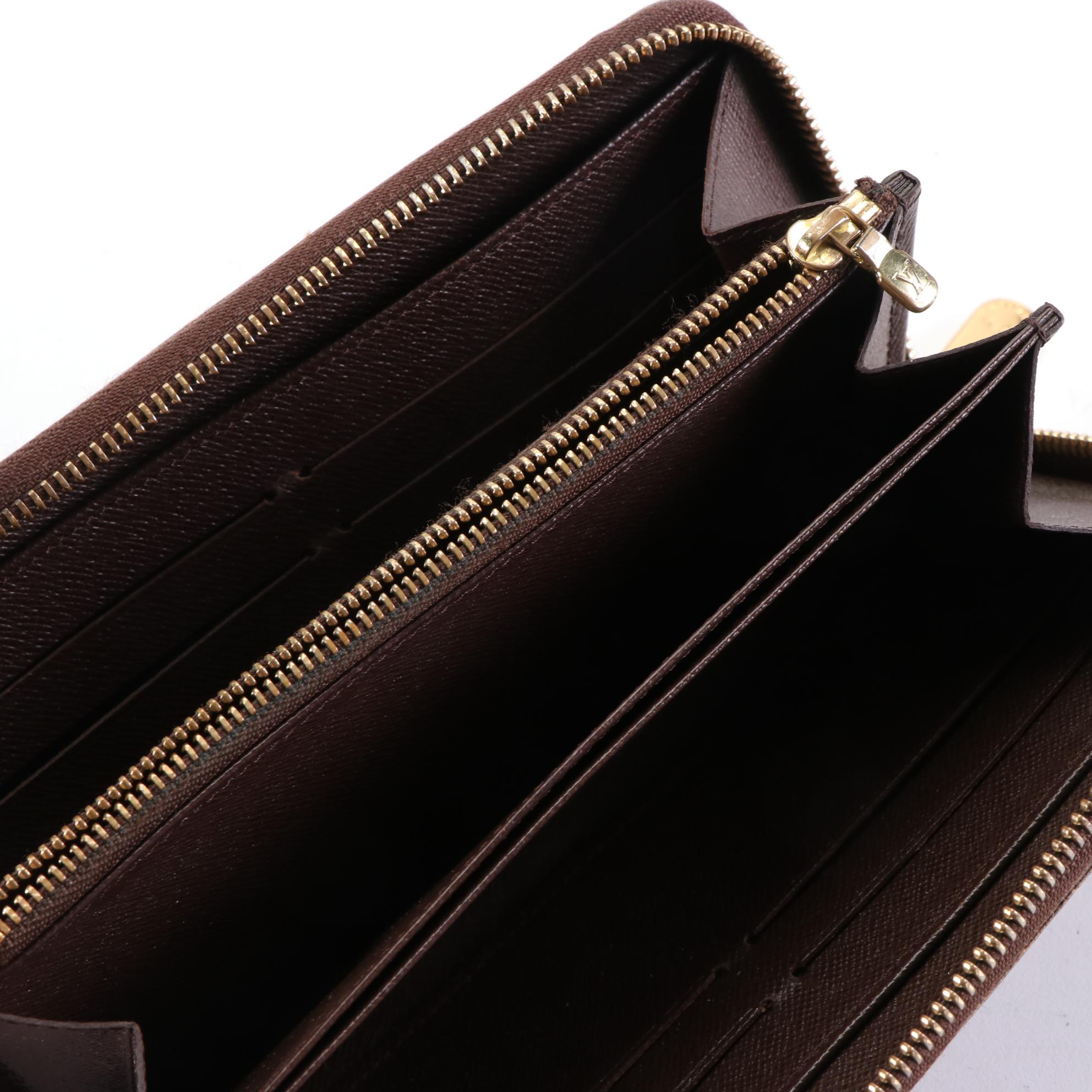 Louis Vuitton Zippy Wallet in Damier Ebene Canvas