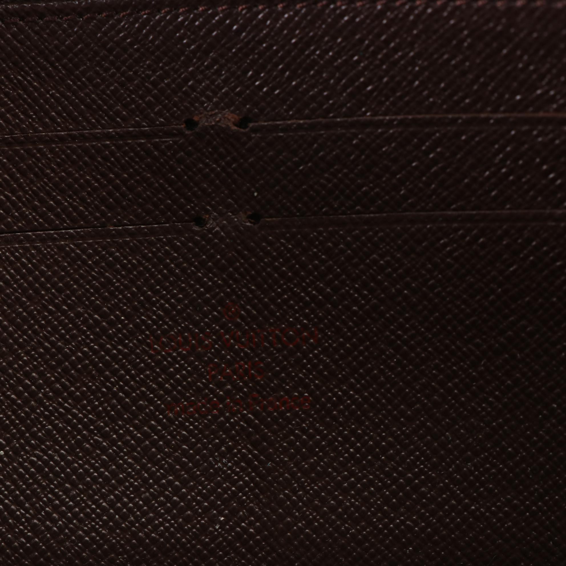Louis Vuitton Zippy Wallet in Damier Ebene Canvas