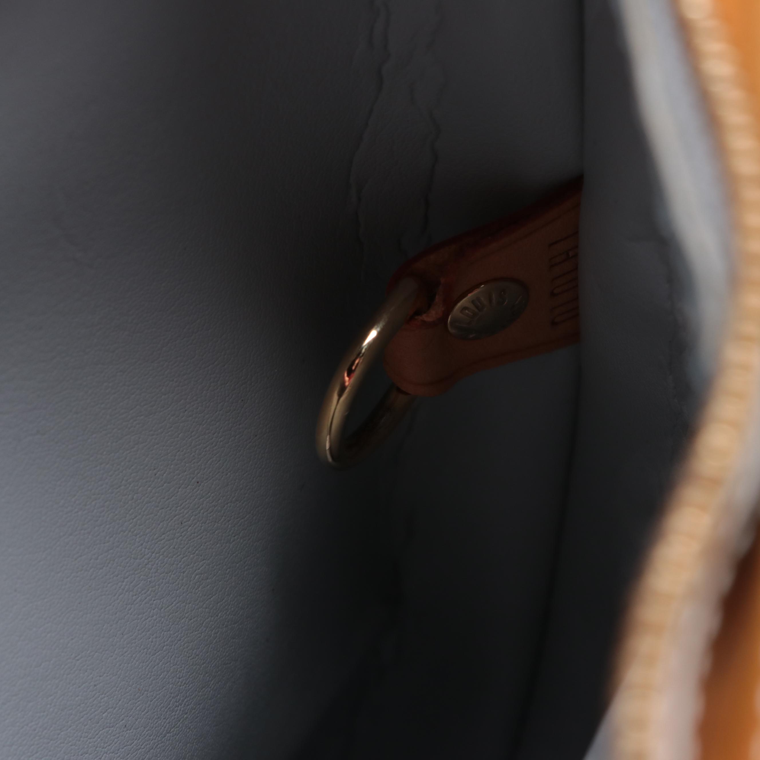 Louis Vuitton Houston Bag in Monogram Vernis and Vachetta Leather