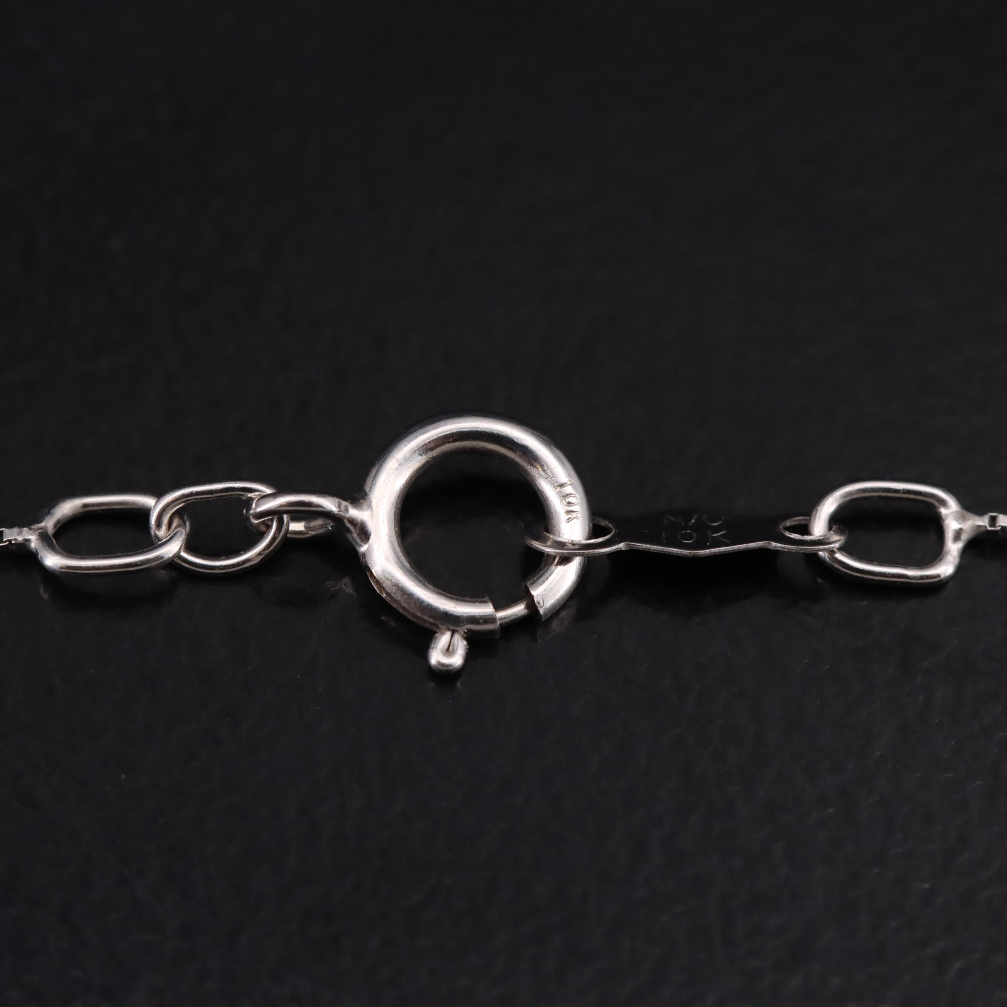 10K 0.51 CTW Diamond Cross Necklace