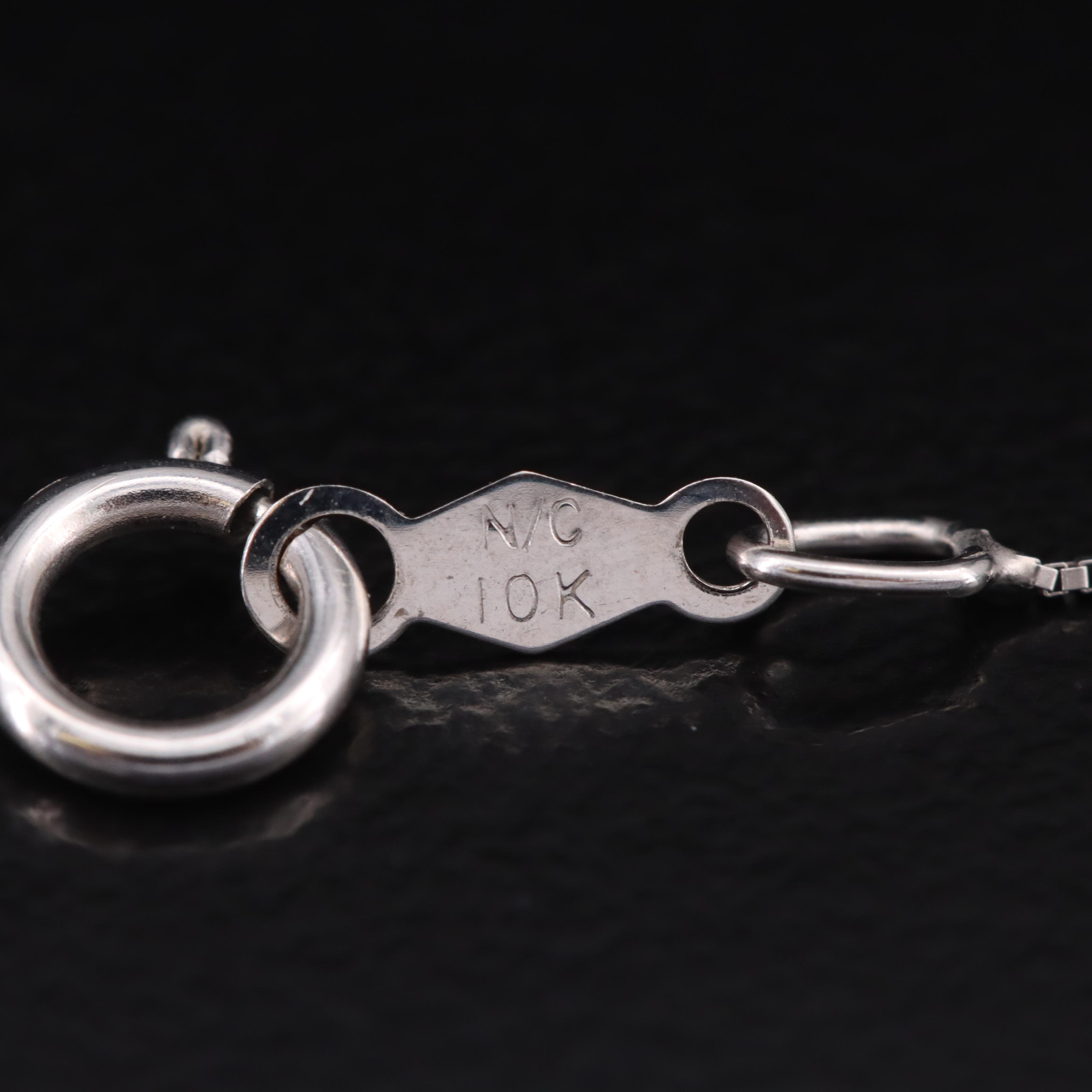 10K 0.51 CTW Diamond Cross Necklace