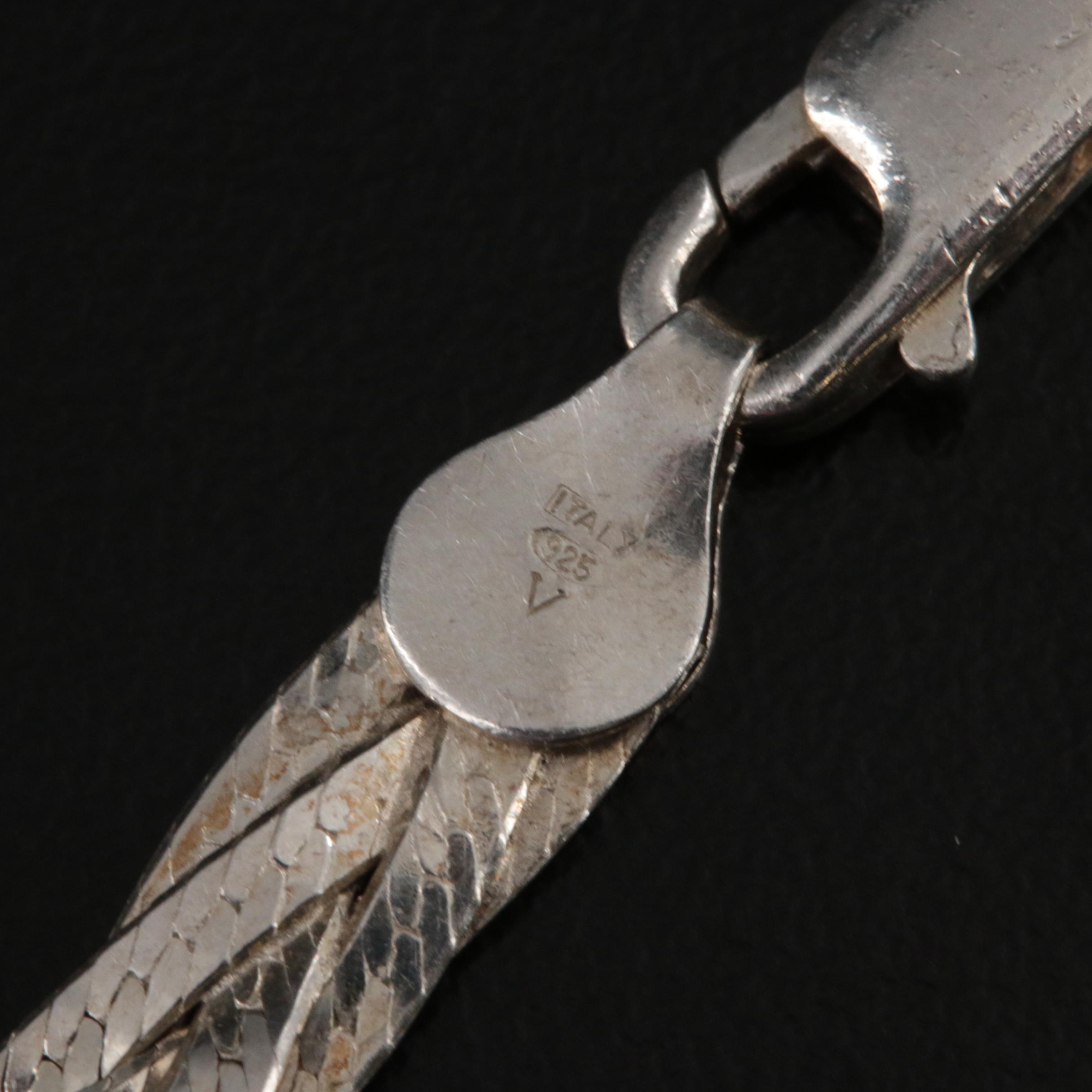 Sterling Black Onyx and Mother-of-Pearl Floral Panel on Braided Herringbone