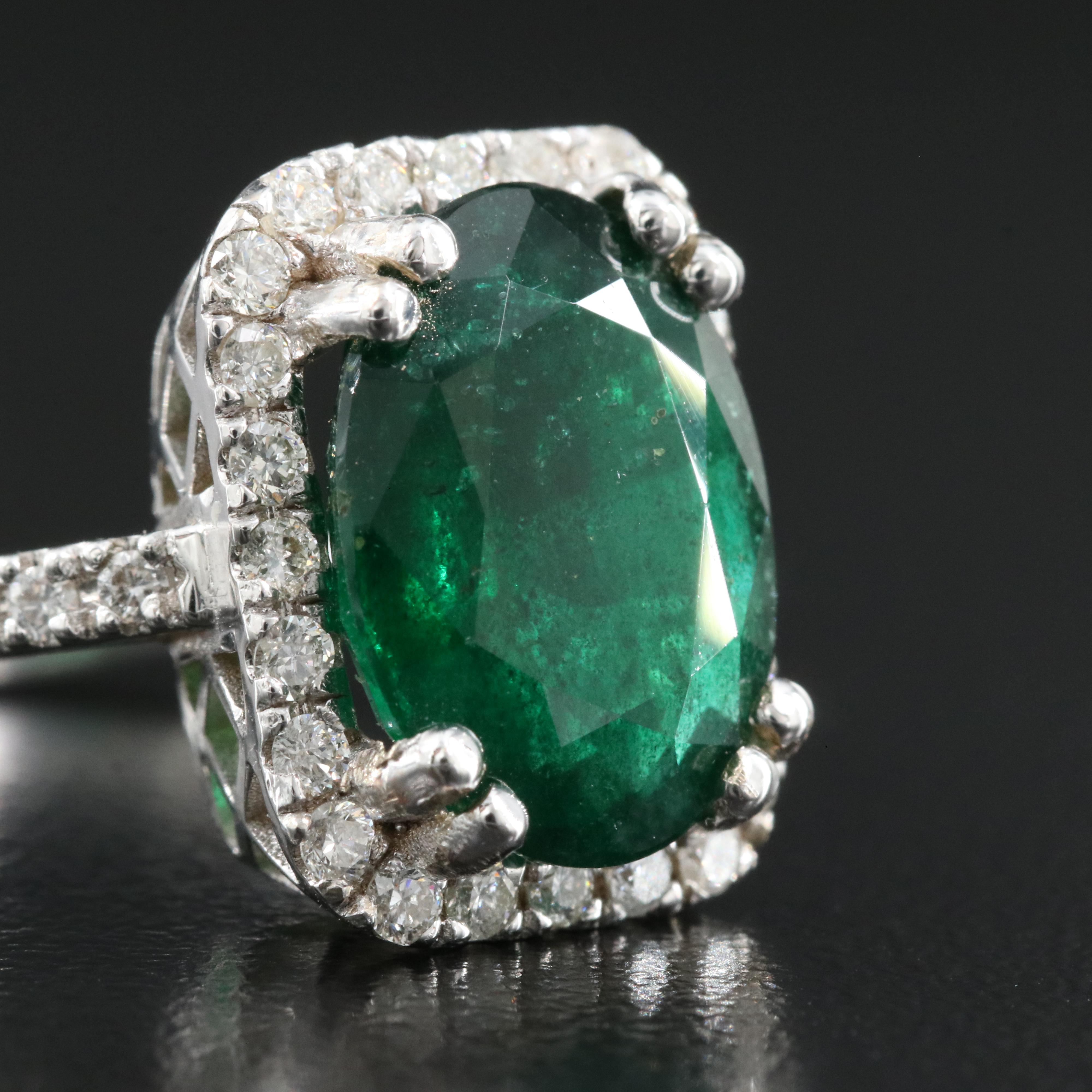18K 4.50 CT Emerald and Diamond Ring