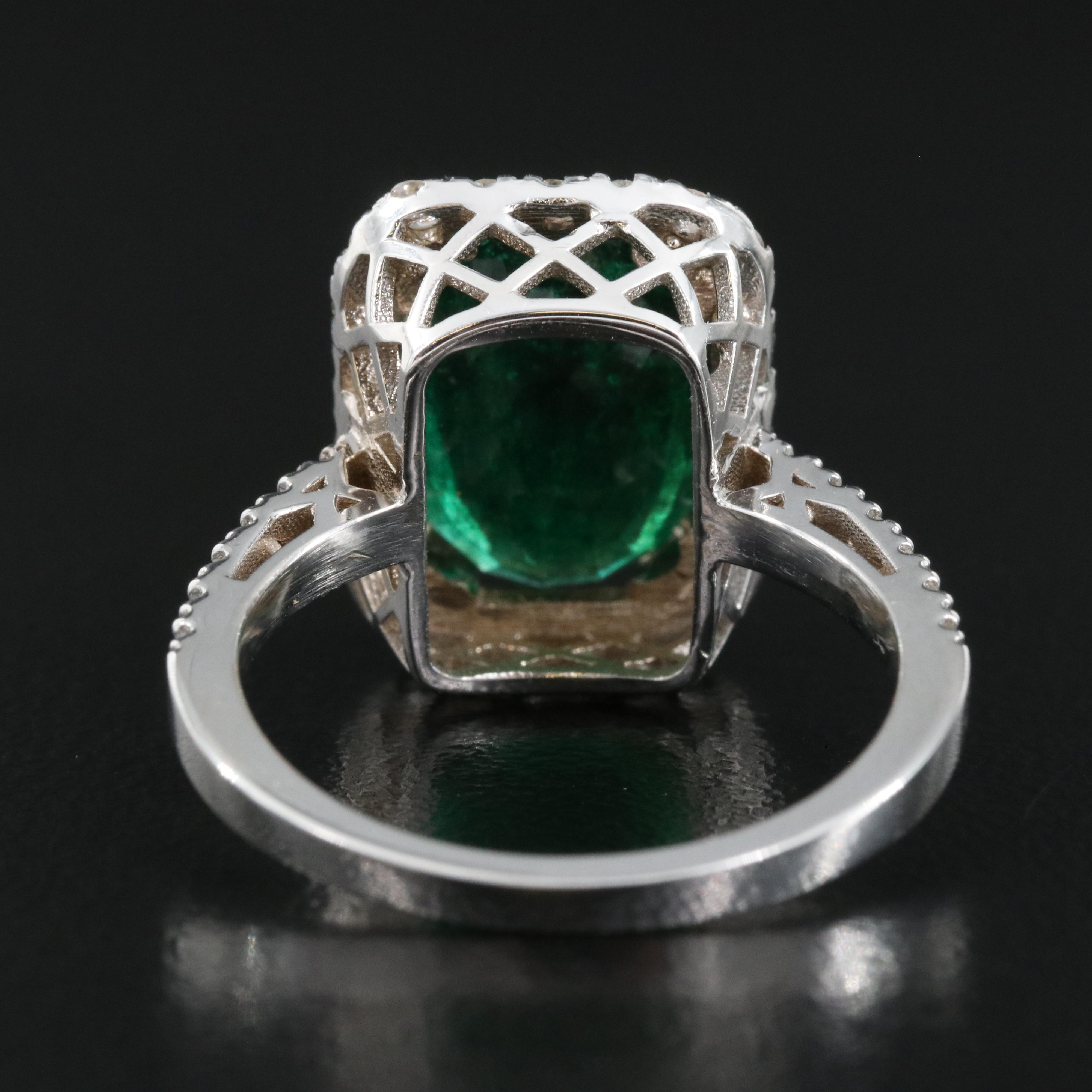 18K 4.50 CT Emerald and Diamond Ring