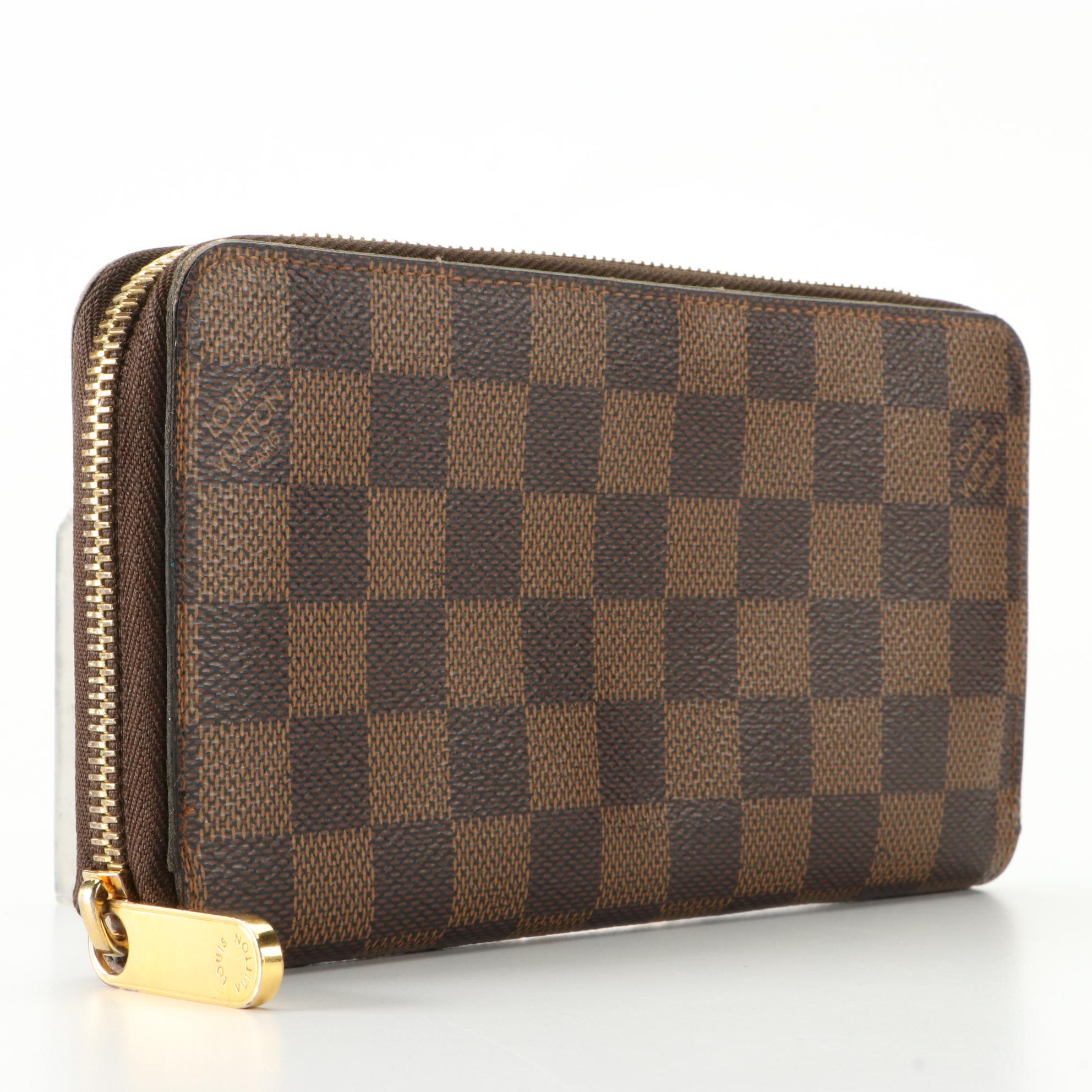 Louis Vuitton Zippy Wallet in Damier Ebene Canvas