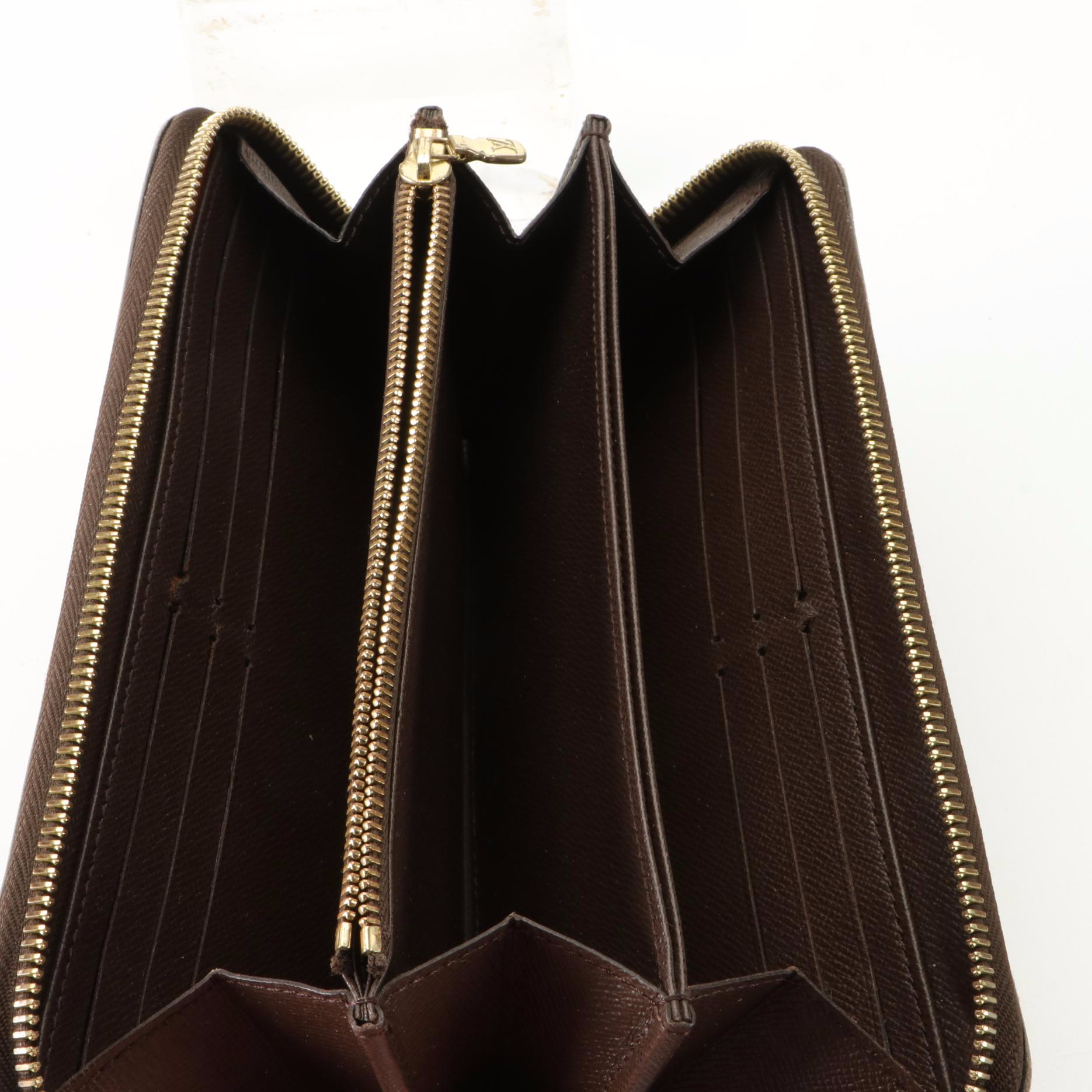 Louis Vuitton Zippy Wallet in Damier Ebene Canvas