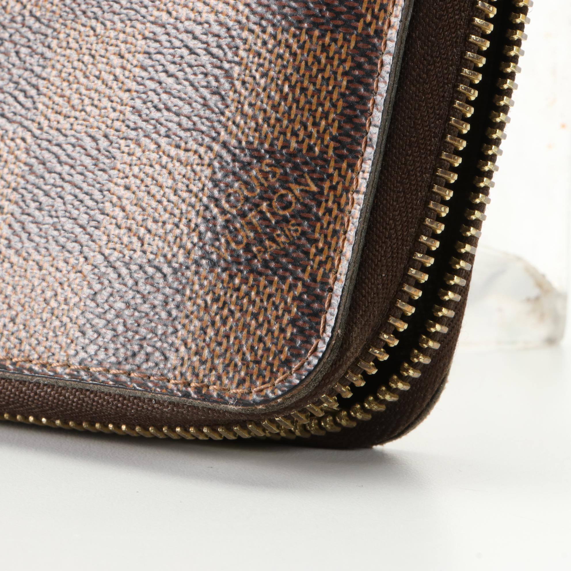 Louis Vuitton Zippy Wallet in Damier Ebene Canvas