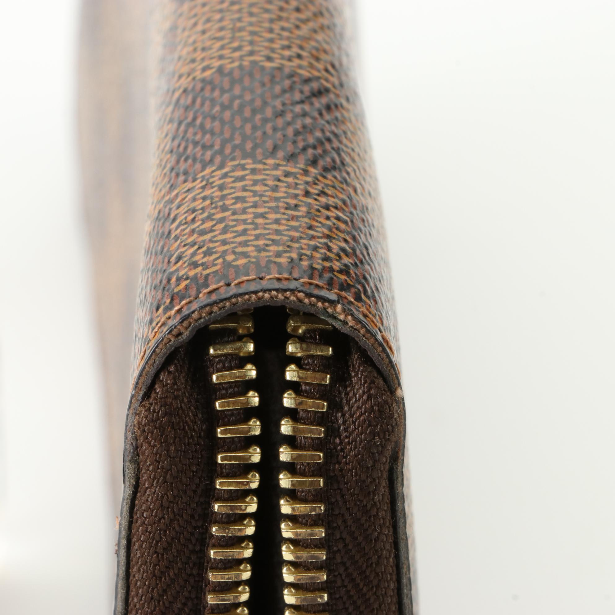 Louis Vuitton Zippy Wallet in Damier Ebene Canvas
