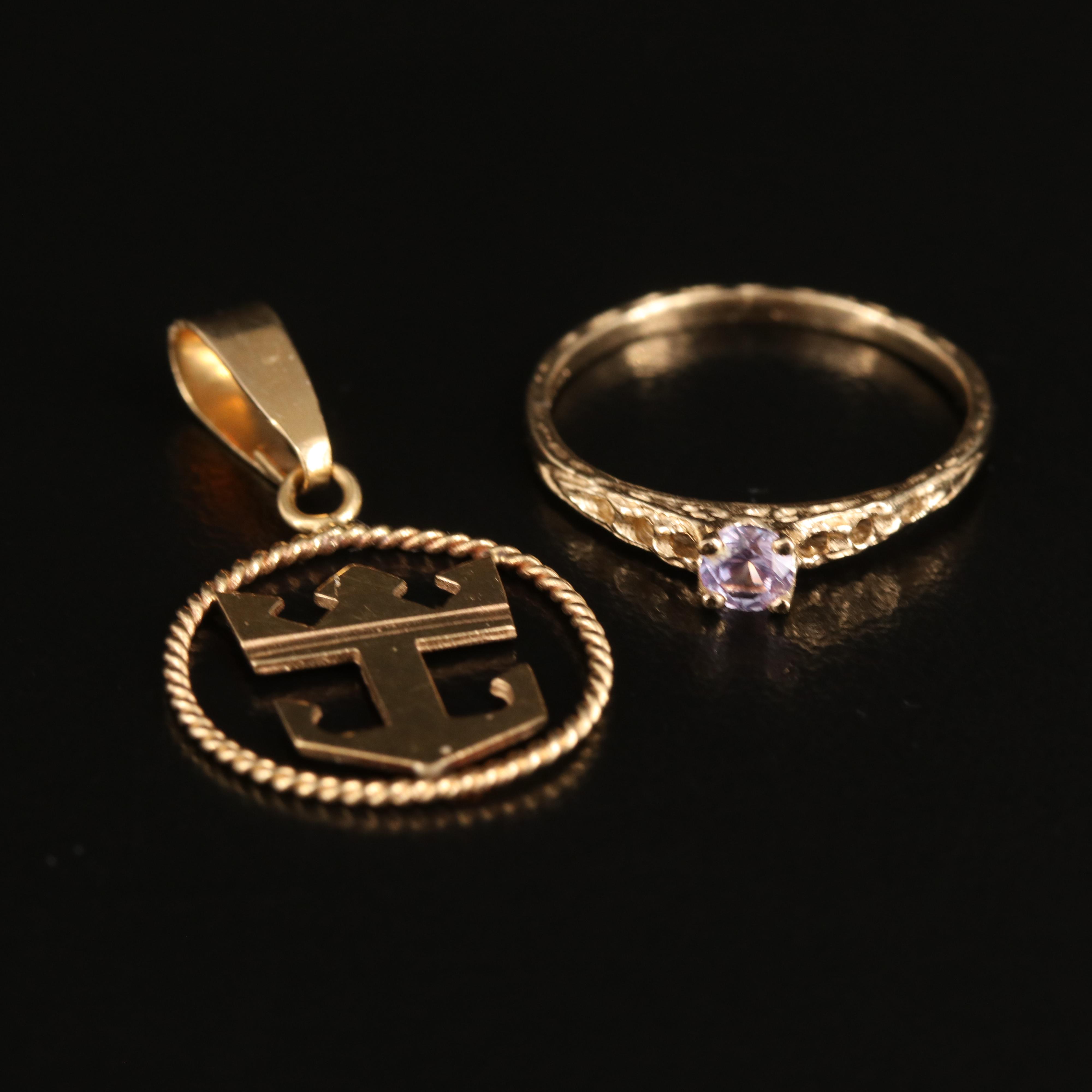 14K Color Change Sapphire Baby Ring and Royal Caribbean Logo Pendant