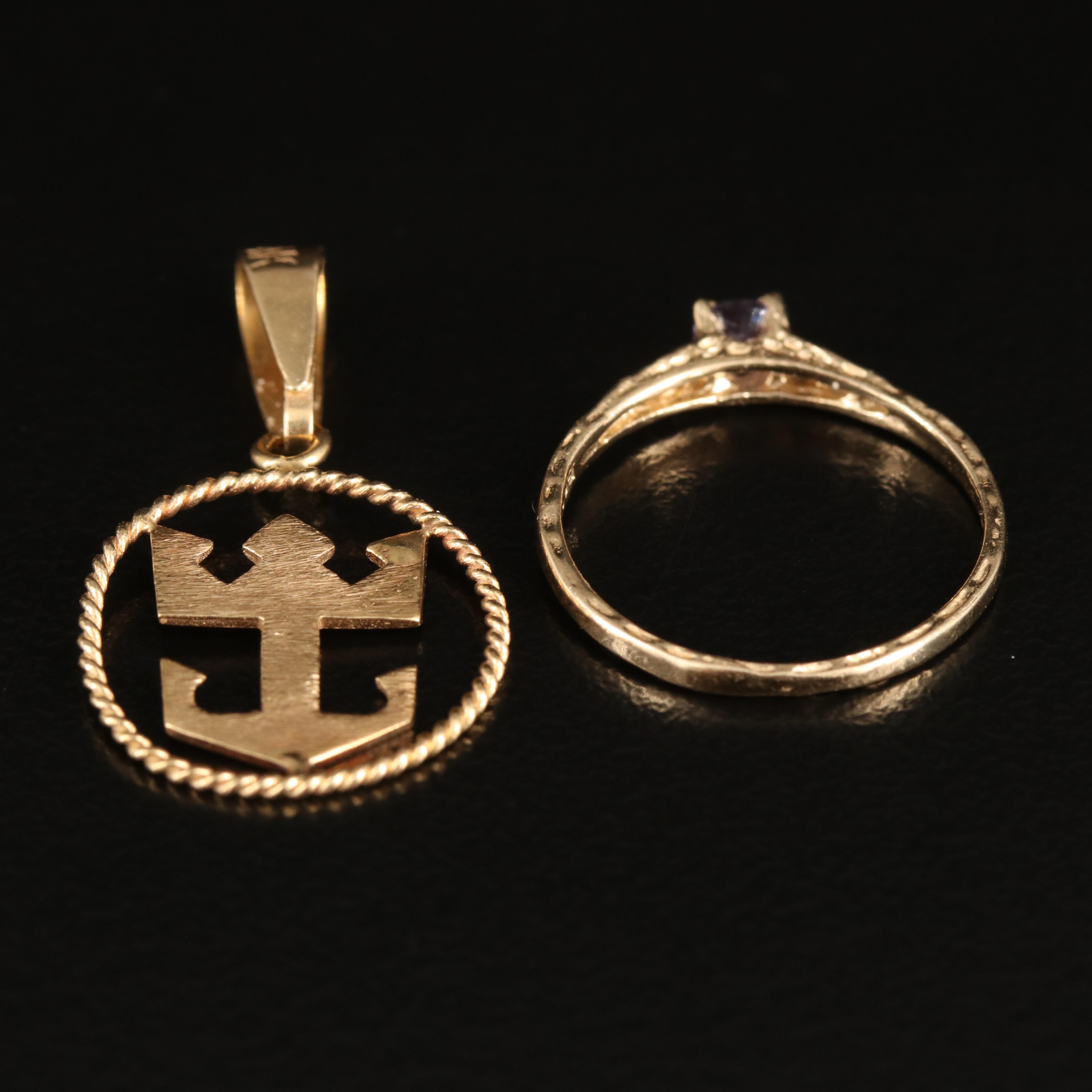 14K Color Change Sapphire Baby Ring and Royal Caribbean Logo Pendant