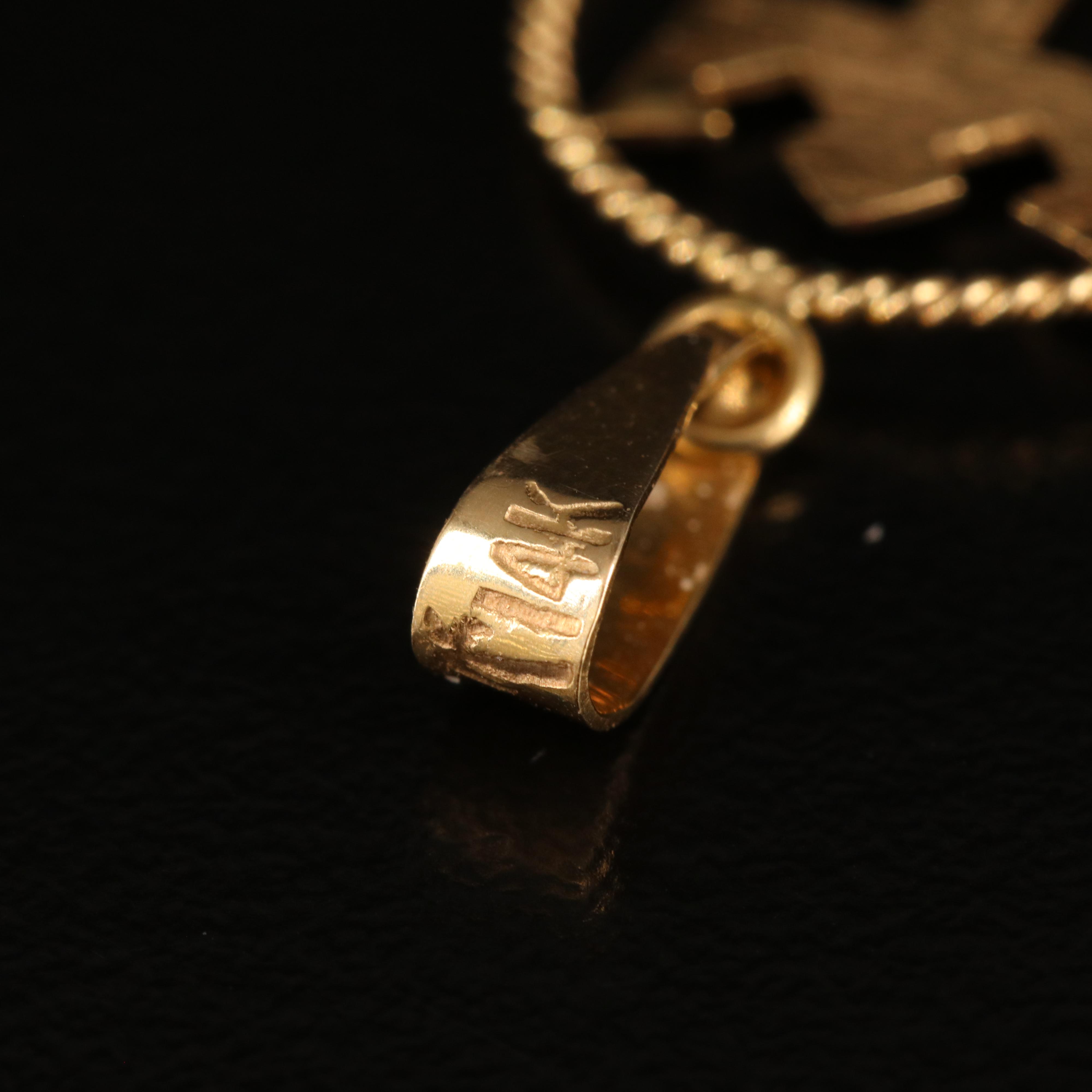 14K Color Change Sapphire Baby Ring and Royal Caribbean Logo Pendant