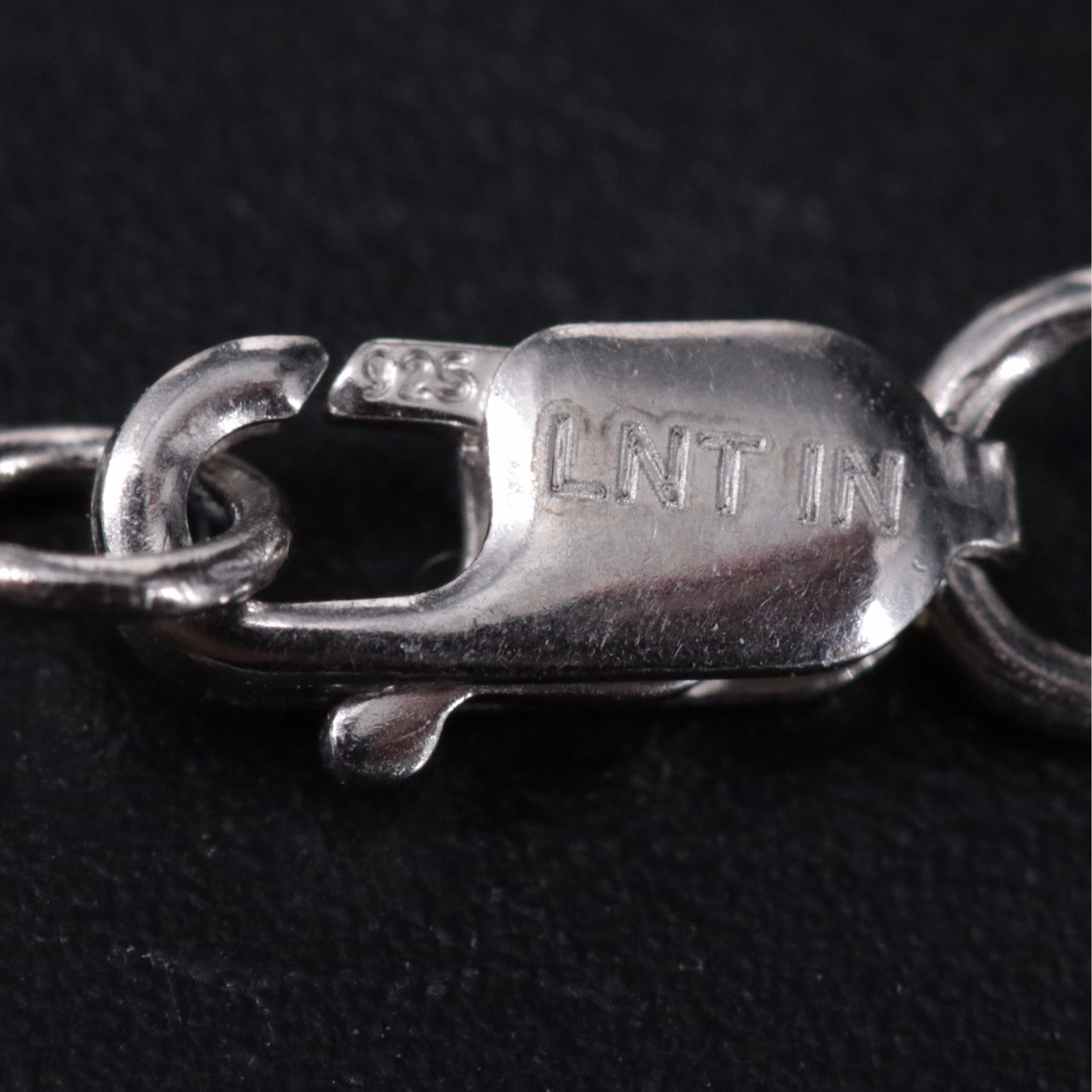 Sterling Silver Topaz and Cubic Zirconia Pendant Necklace