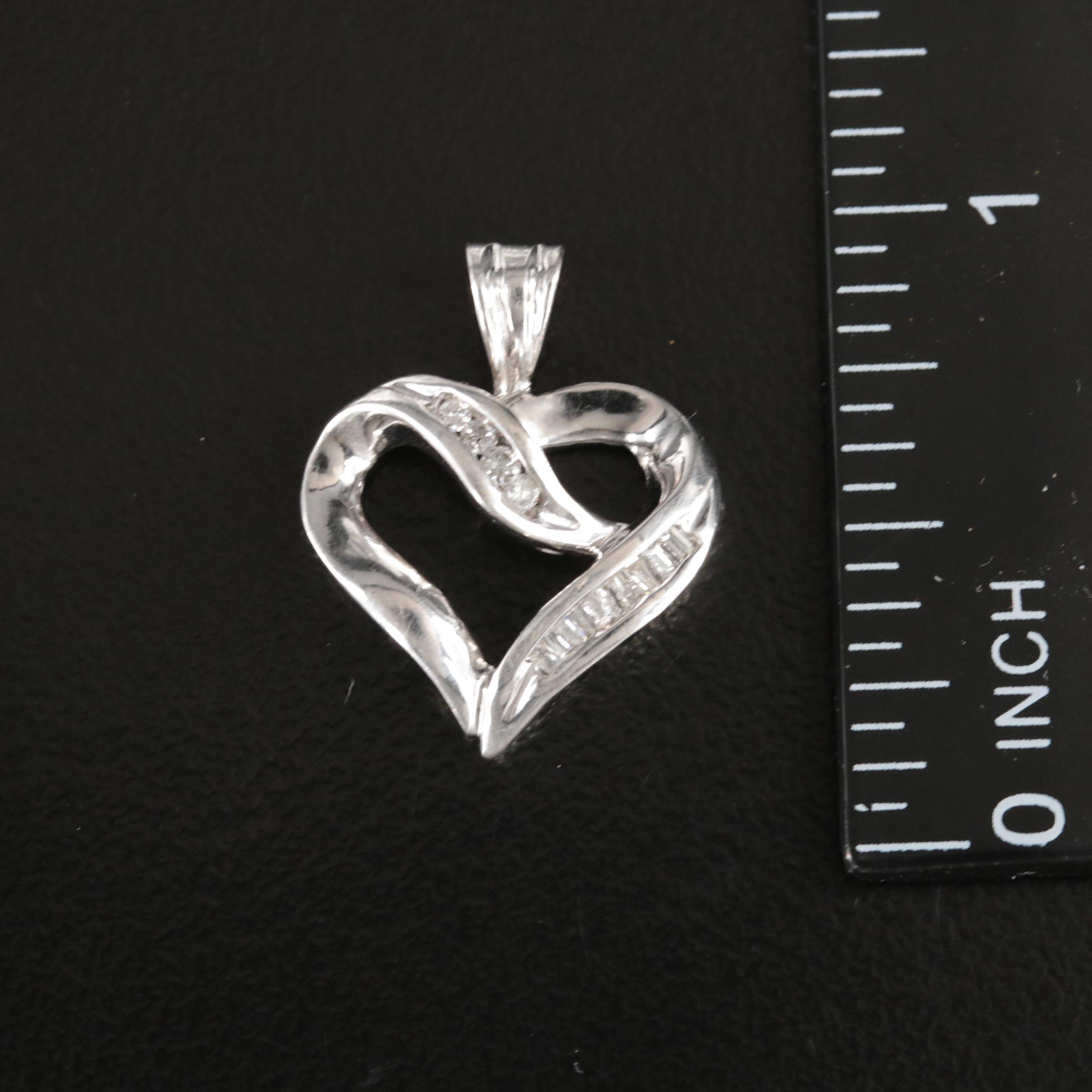 10K 0.11 CTW Diamond Heart Pendant