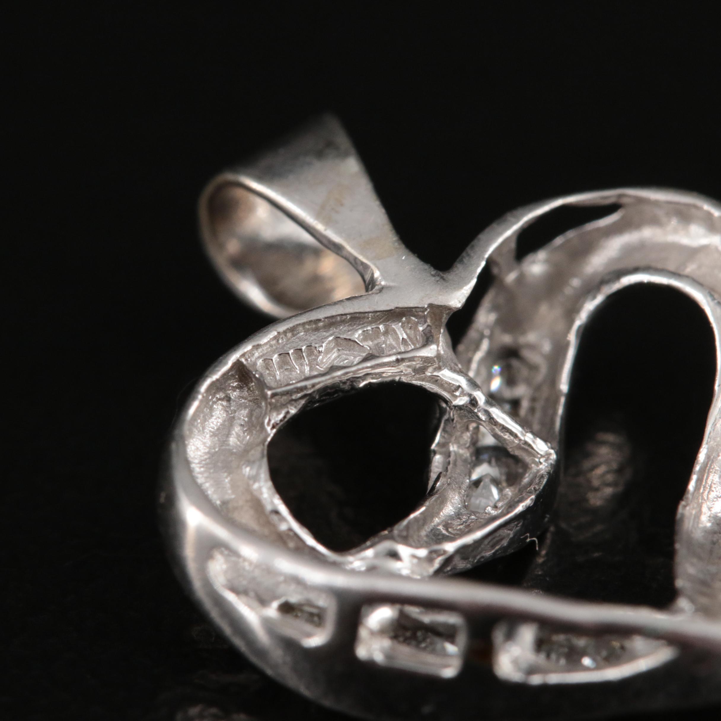 10K 0.11 CTW Diamond Heart Pendant