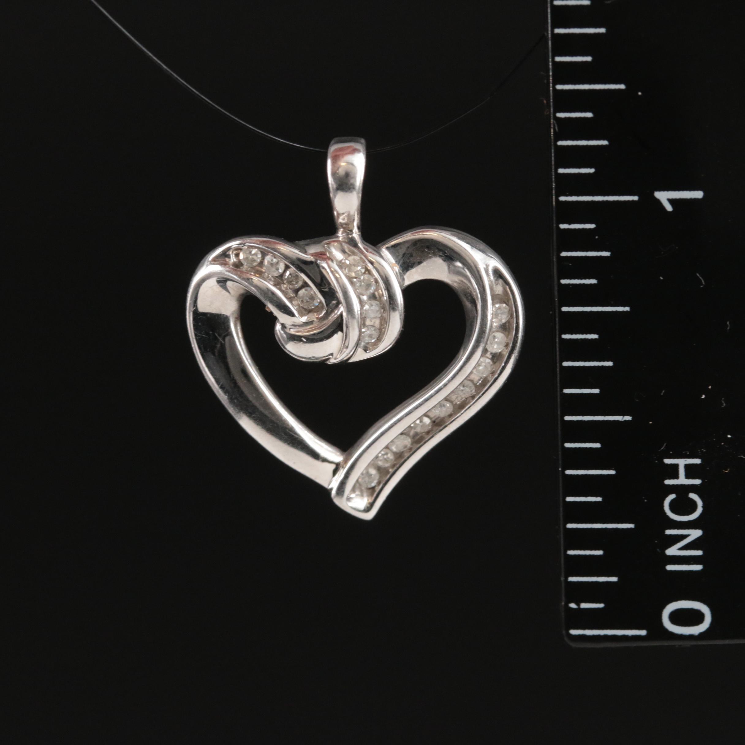 10K 0.17 CTW Diamond Heart Pendant